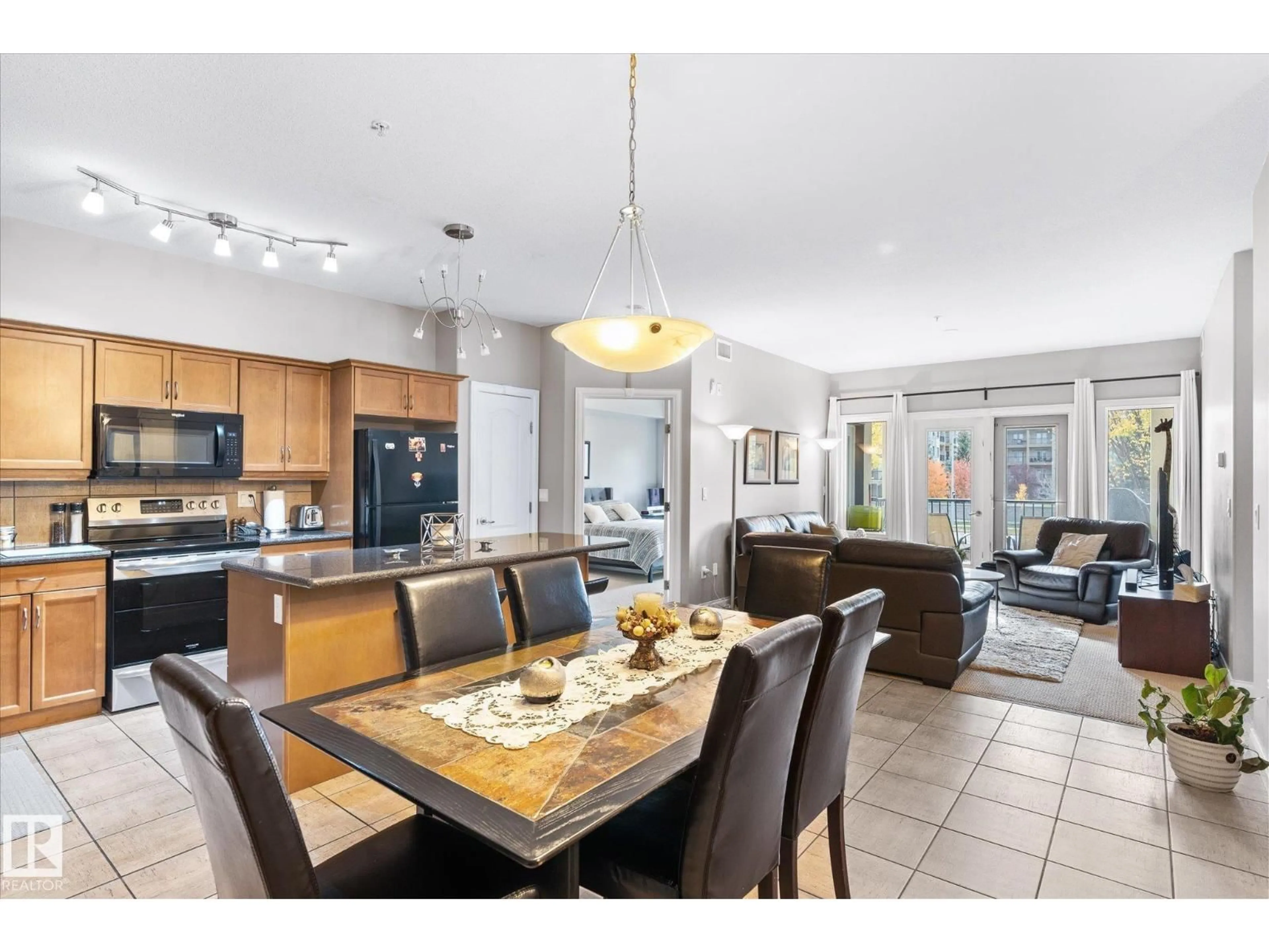 Open concept kitchen, ceramic/tile floor for #213 - 1406 HODGSON WY, Edmonton Alberta T6R3N1