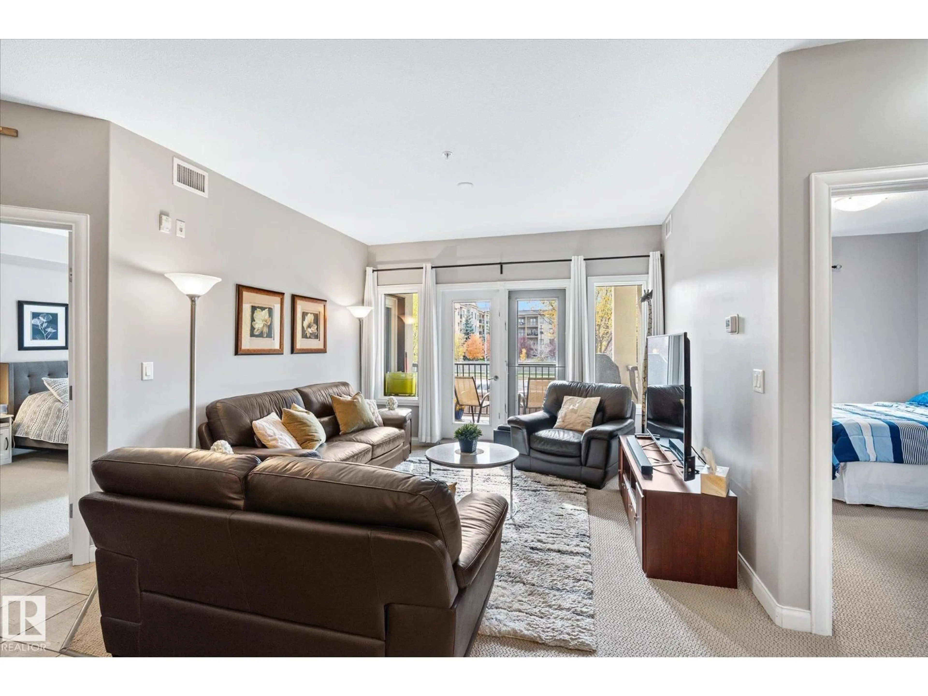 Living room with furniture, unknown for #213 - 1406 HODGSON WY, Edmonton Alberta T6R3N1