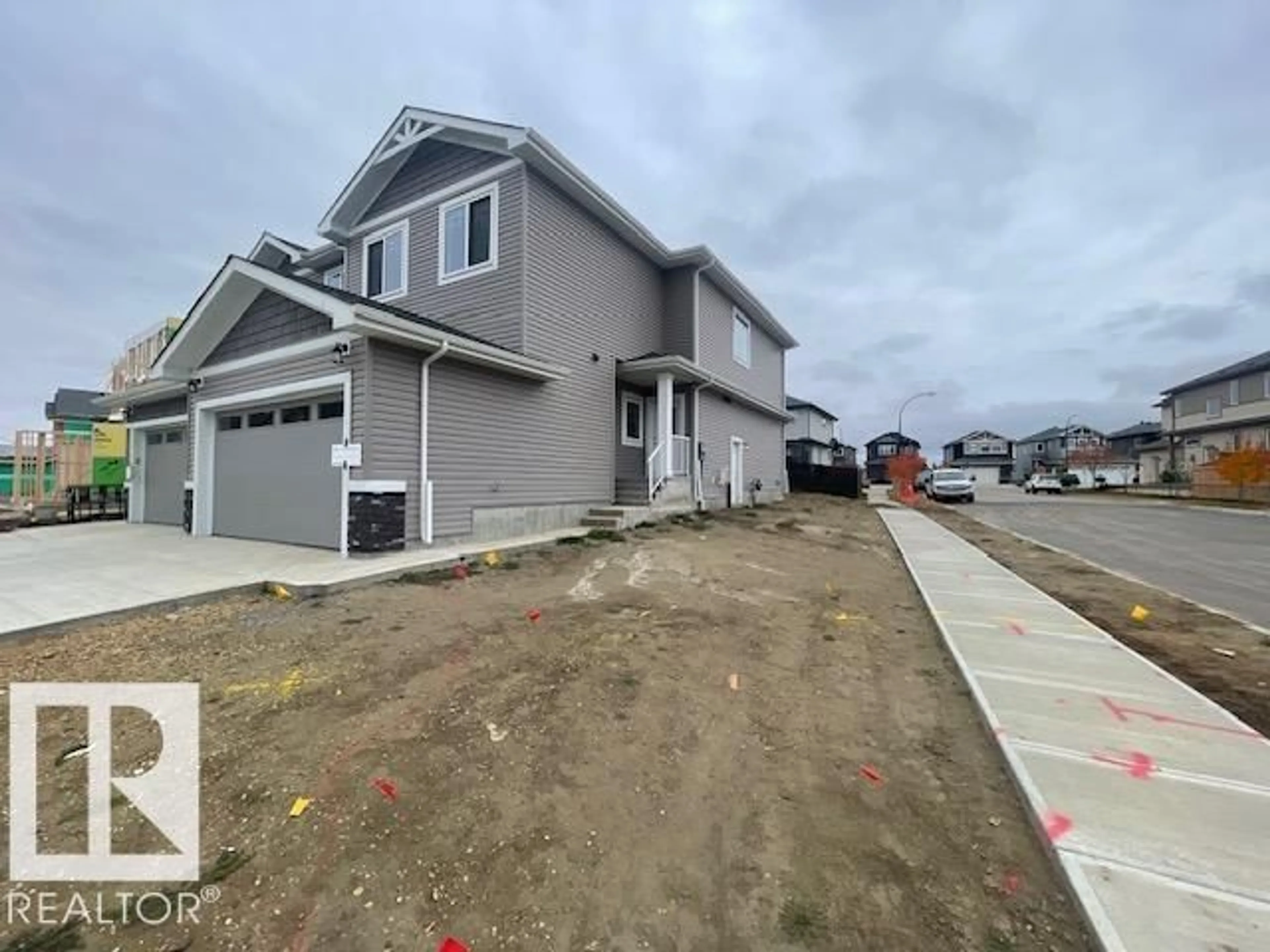 Home with vinyl exterior material, street for 125 FICUS WY, Fort Saskatchewan Alberta T8L1X8