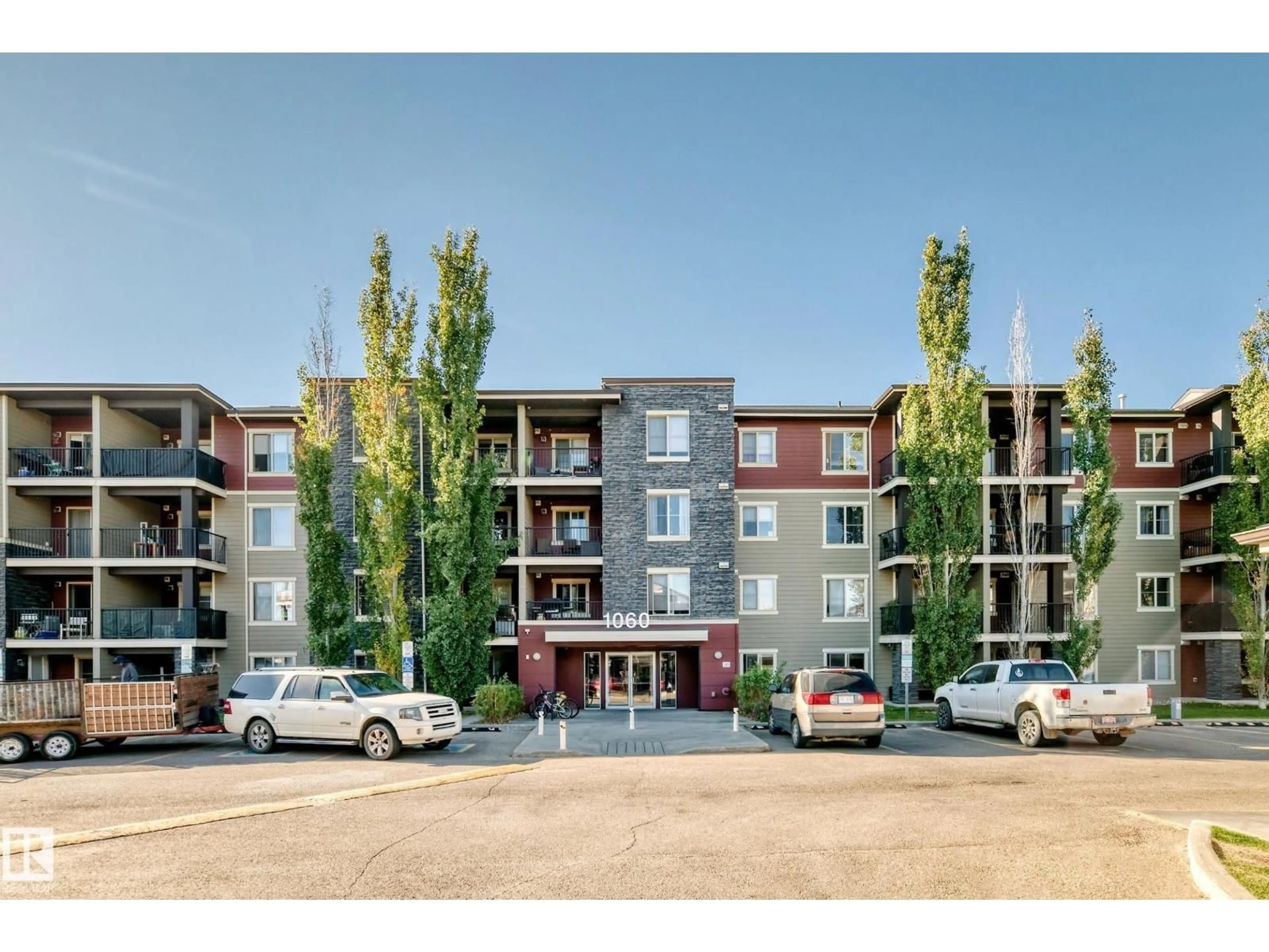 A pic from outside/outdoor area/front of a property/back of a property/a pic from drone, building for #406 - 1060 MCCONACHIE BV, Edmonton Alberta T5Y0W9
