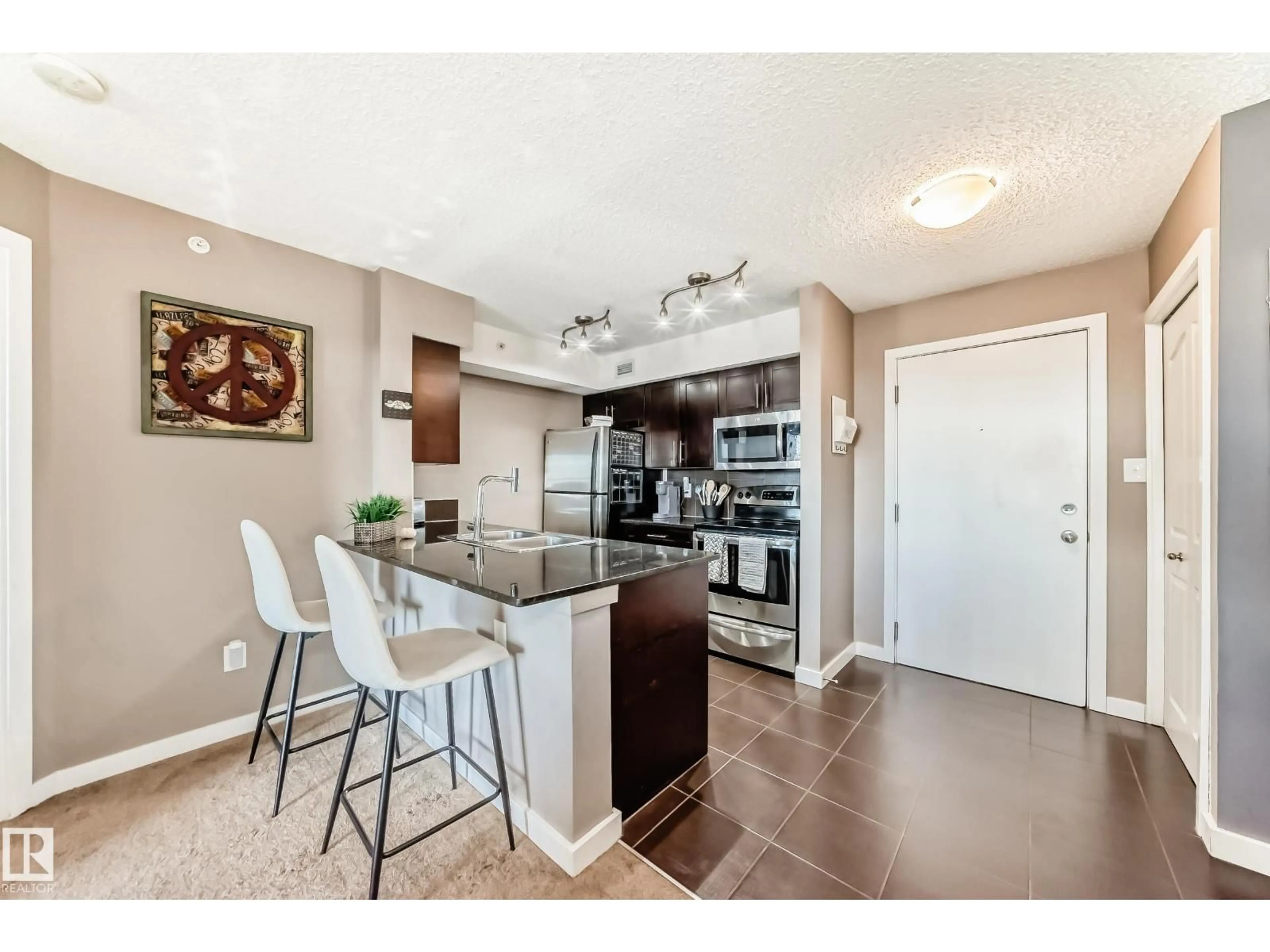 Open concept kitchen, unknown for #406 - 1060 MCCONACHIE BV, Edmonton Alberta T5Y0W9