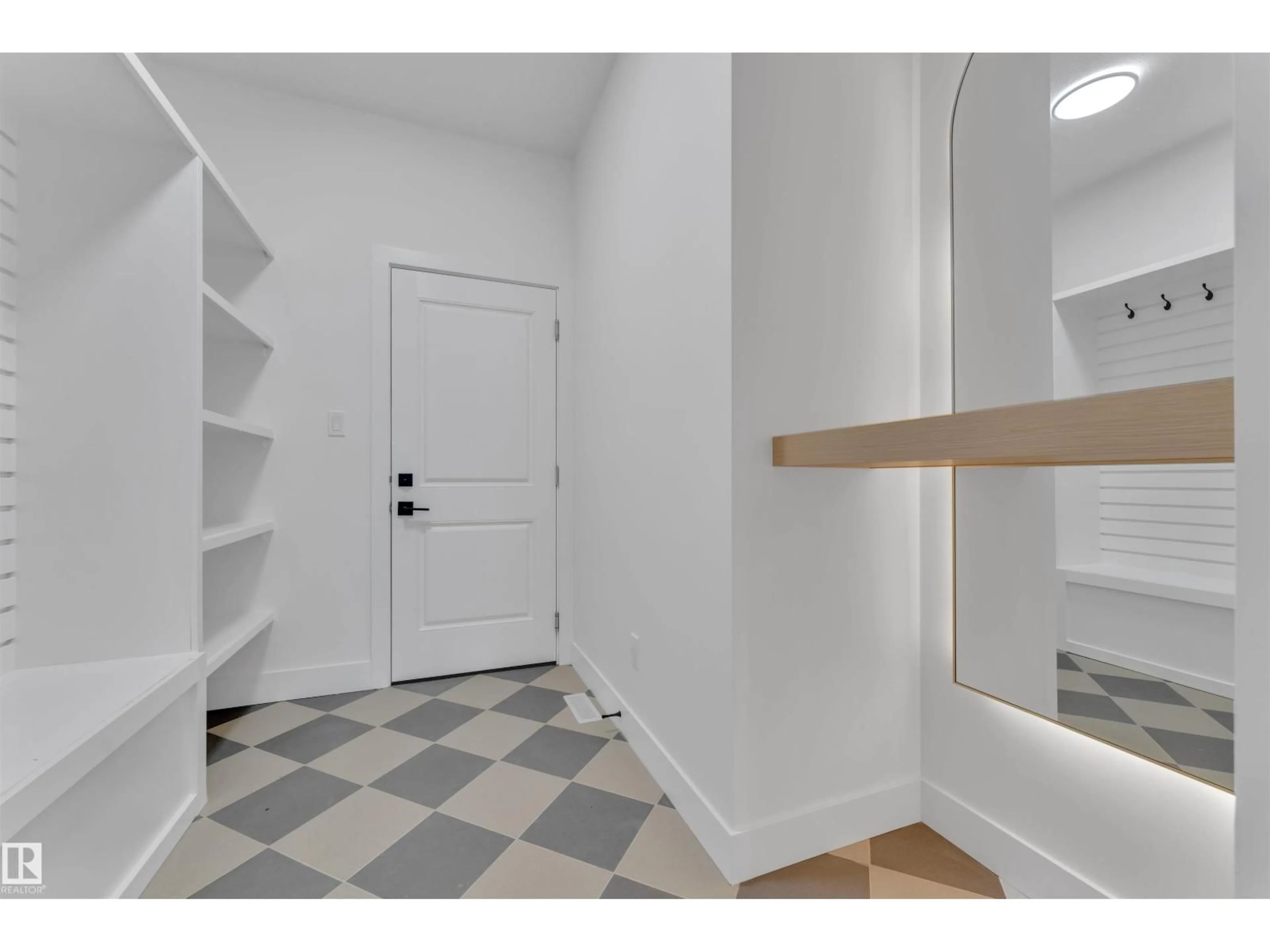 Indoor entryway for 2408 1 AVE SW, Edmonton Alberta T6X3E2