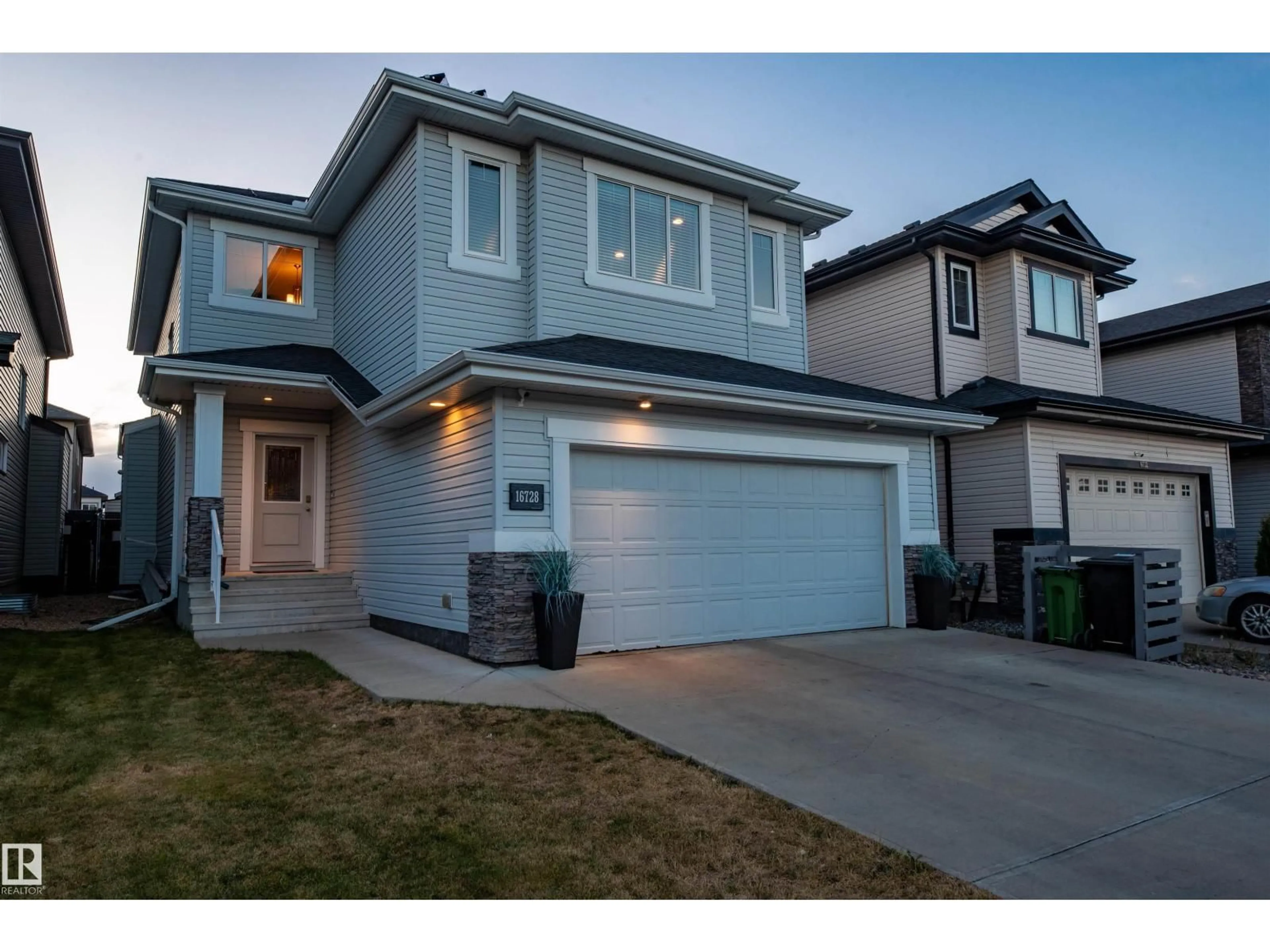 Home with vinyl exterior material, street for NW - 16728 60 ST, Edmonton Alberta T5Y0W6