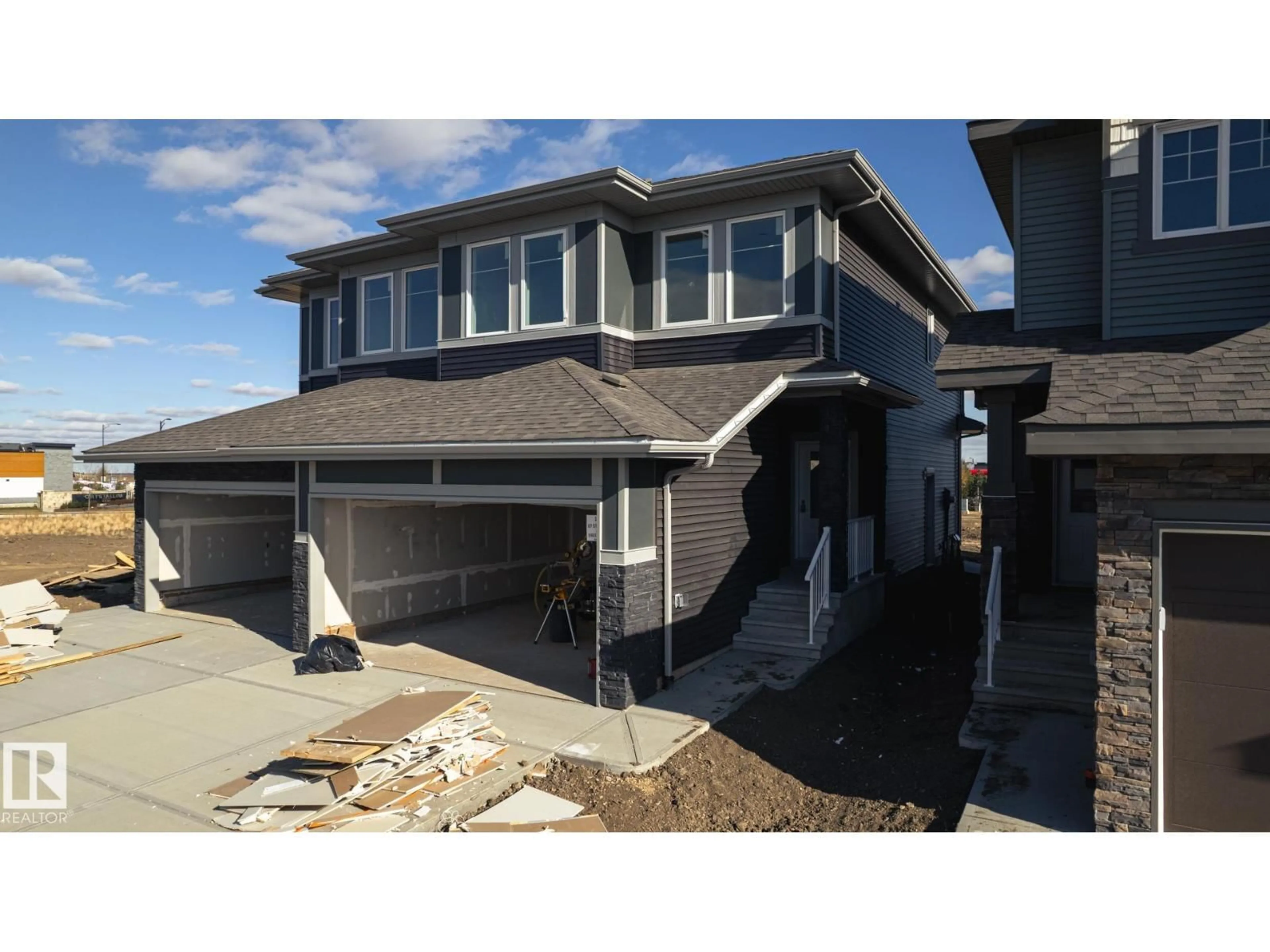 Home with vinyl exterior material, street for NW - 17619 67 ST, Edmonton Alberta T5Z0W6