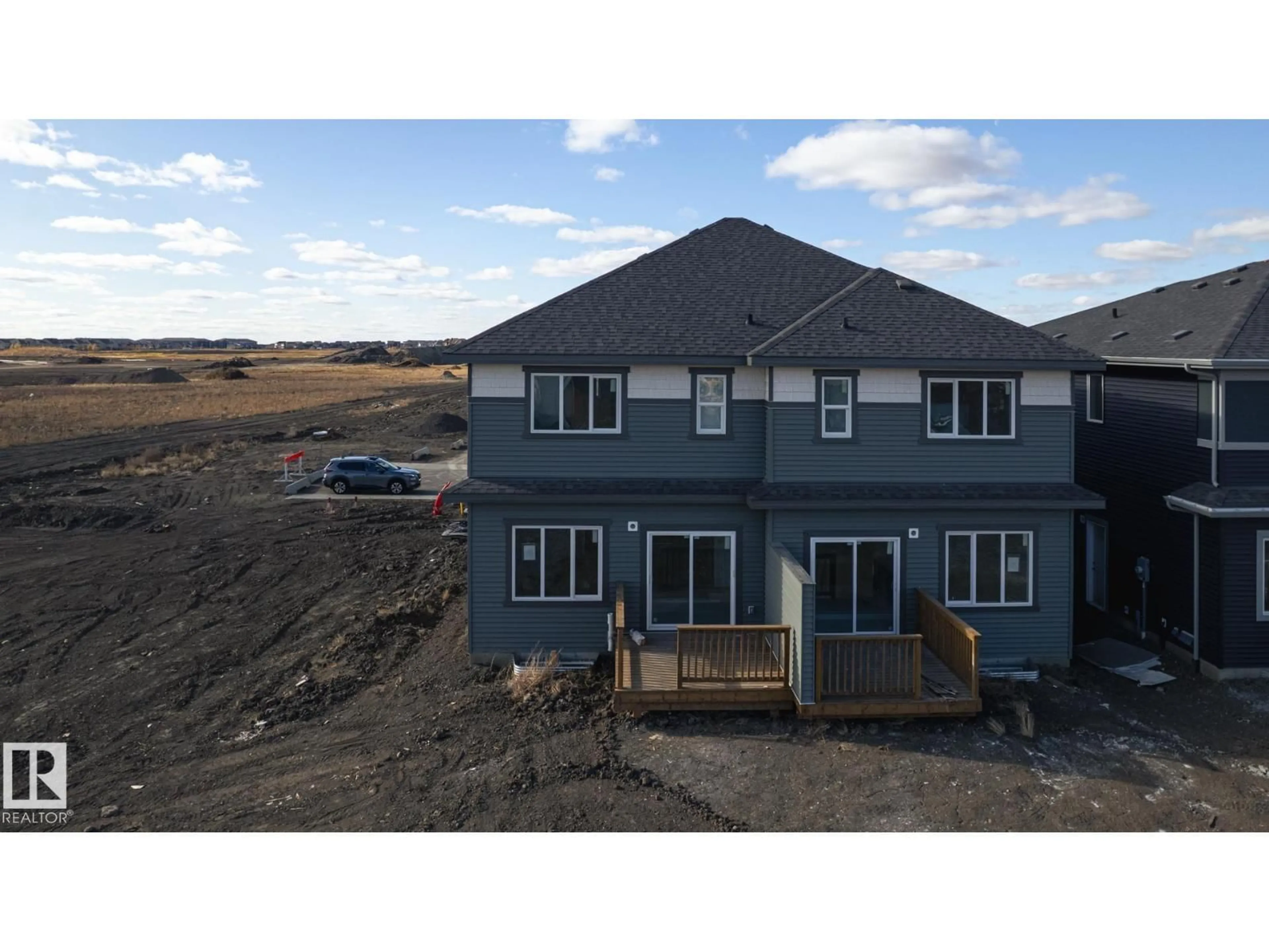A pic from outside/outdoor area/front of a property/back of a property/a pic from drone, building for 17615 67 ST, Edmonton Alberta T5Z0W6