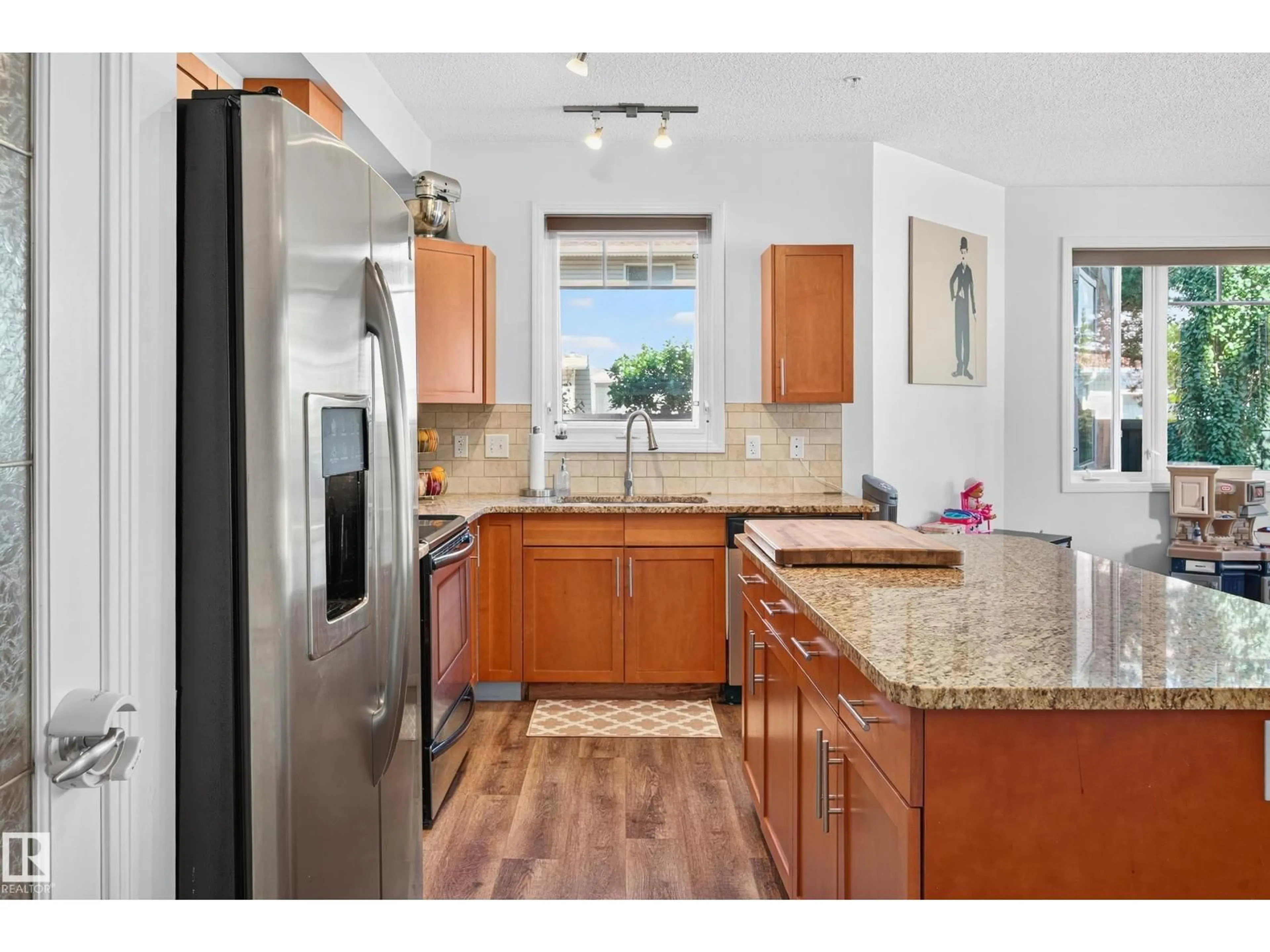 Open concept kitchen, ceramic/tile floor for #111 - 2035 GRANTHAM CO, Edmonton Alberta T5T3X4