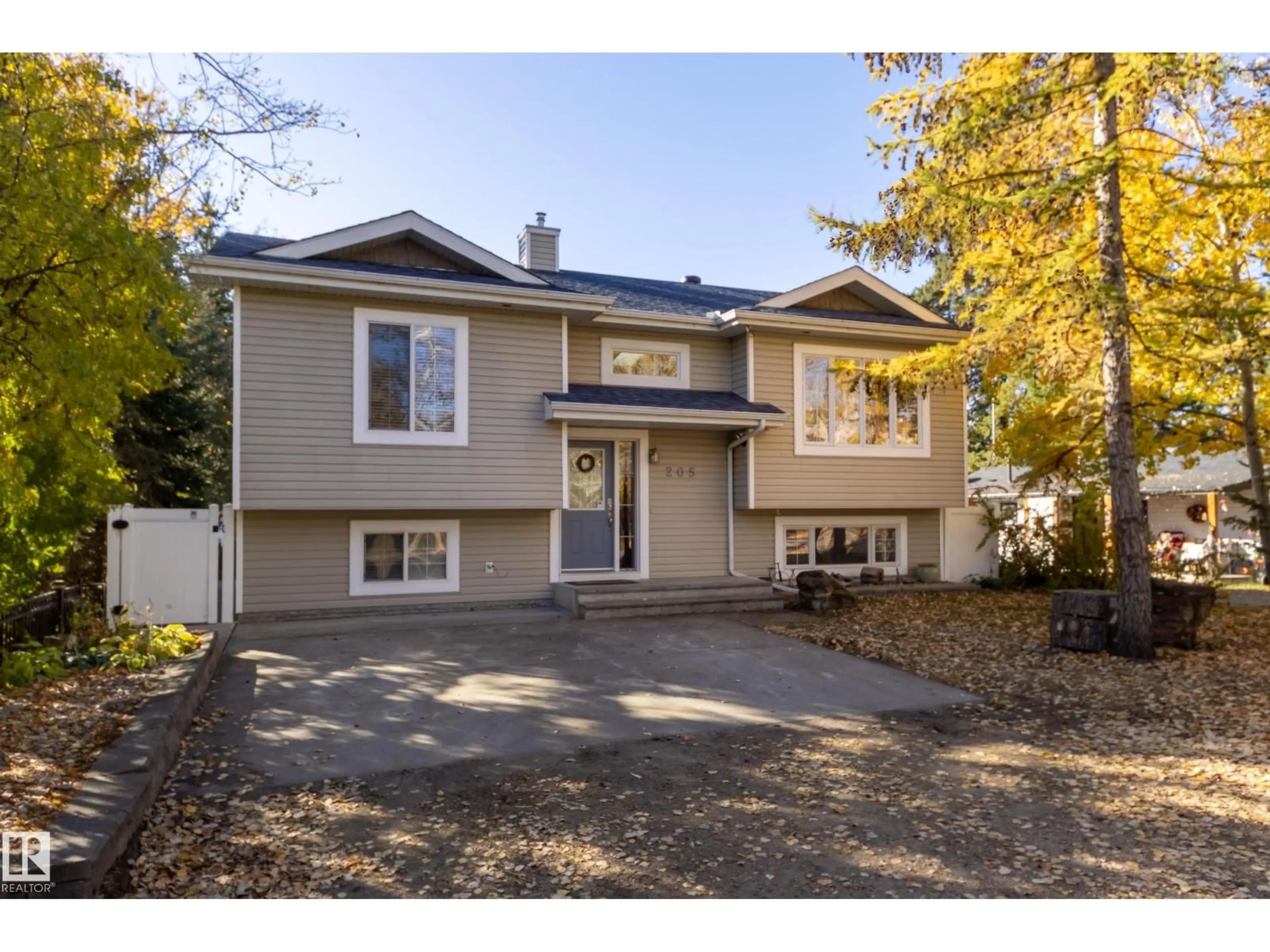 Home with vinyl exterior material, street for 205 22106 S COOKING LAKE RD NW, Rural Strathcona County Alberta T8E1J1