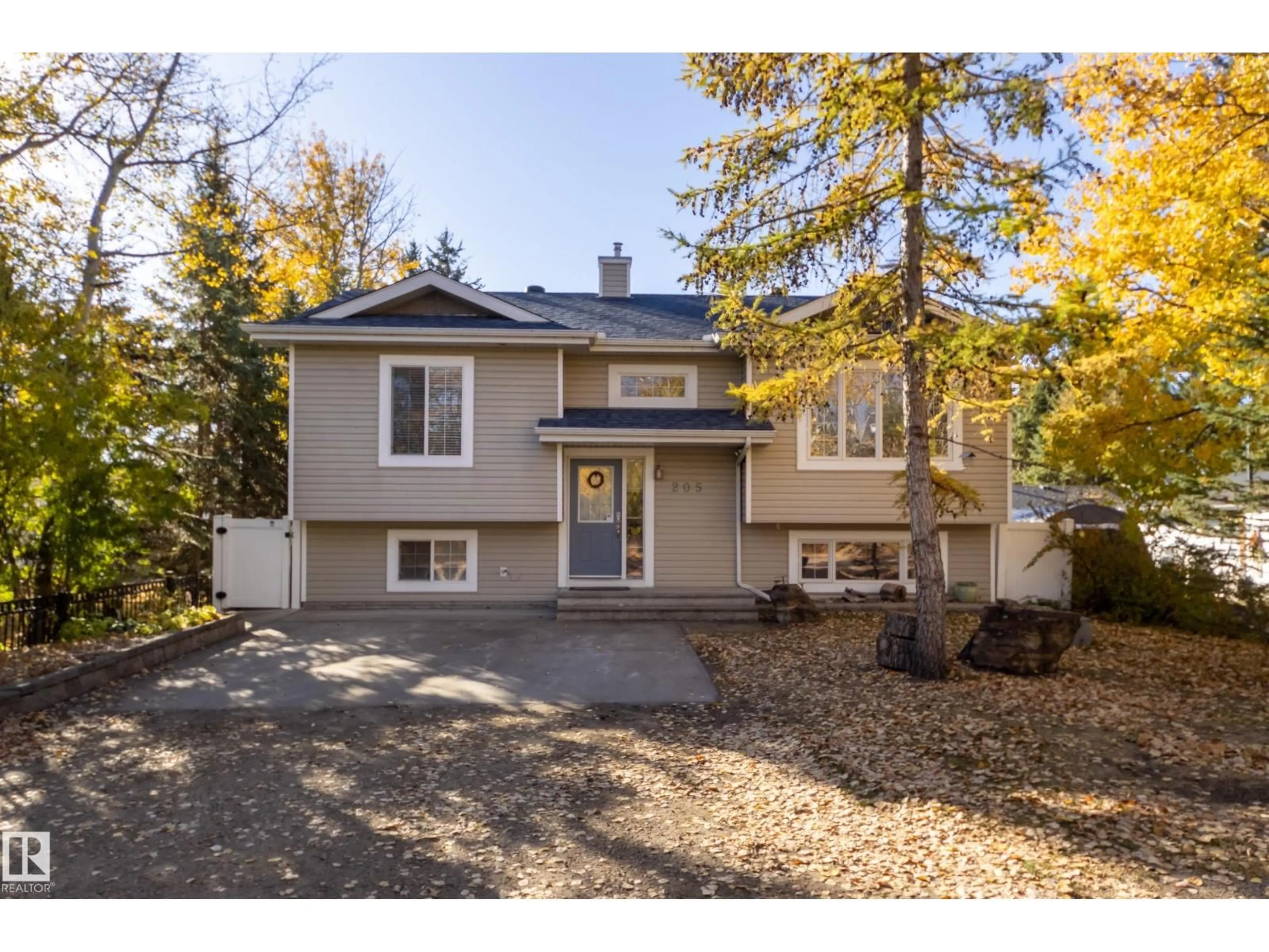 Home with vinyl exterior material, street for 205 22106 S COOKING LAKE RD NW, Rural Strathcona County Alberta T8E1J1