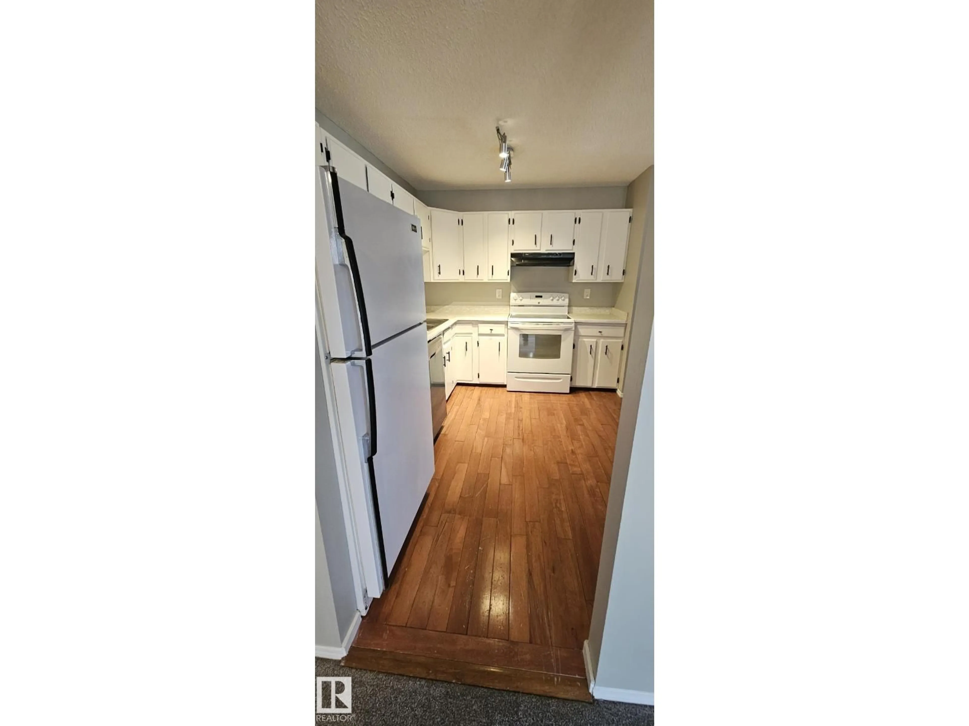 Standard kitchen, wood/laminate floor for 17049 100 ST, Edmonton Alberta T5X4R8