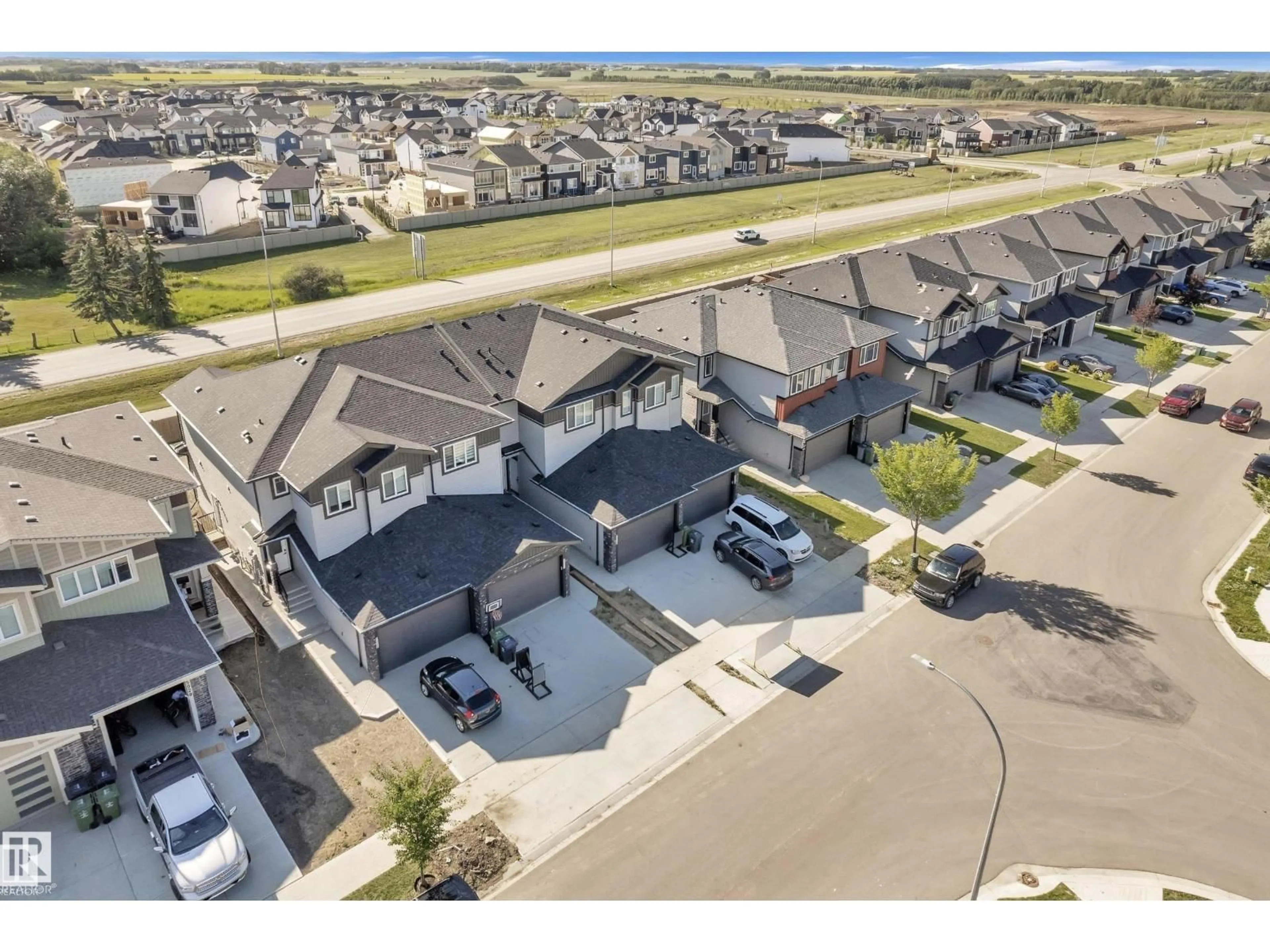 A pic from outside/outdoor area/front of a property/back of a property/a pic from drone, street for 5024 67 ST, Beaumont Alberta T6X2A2
