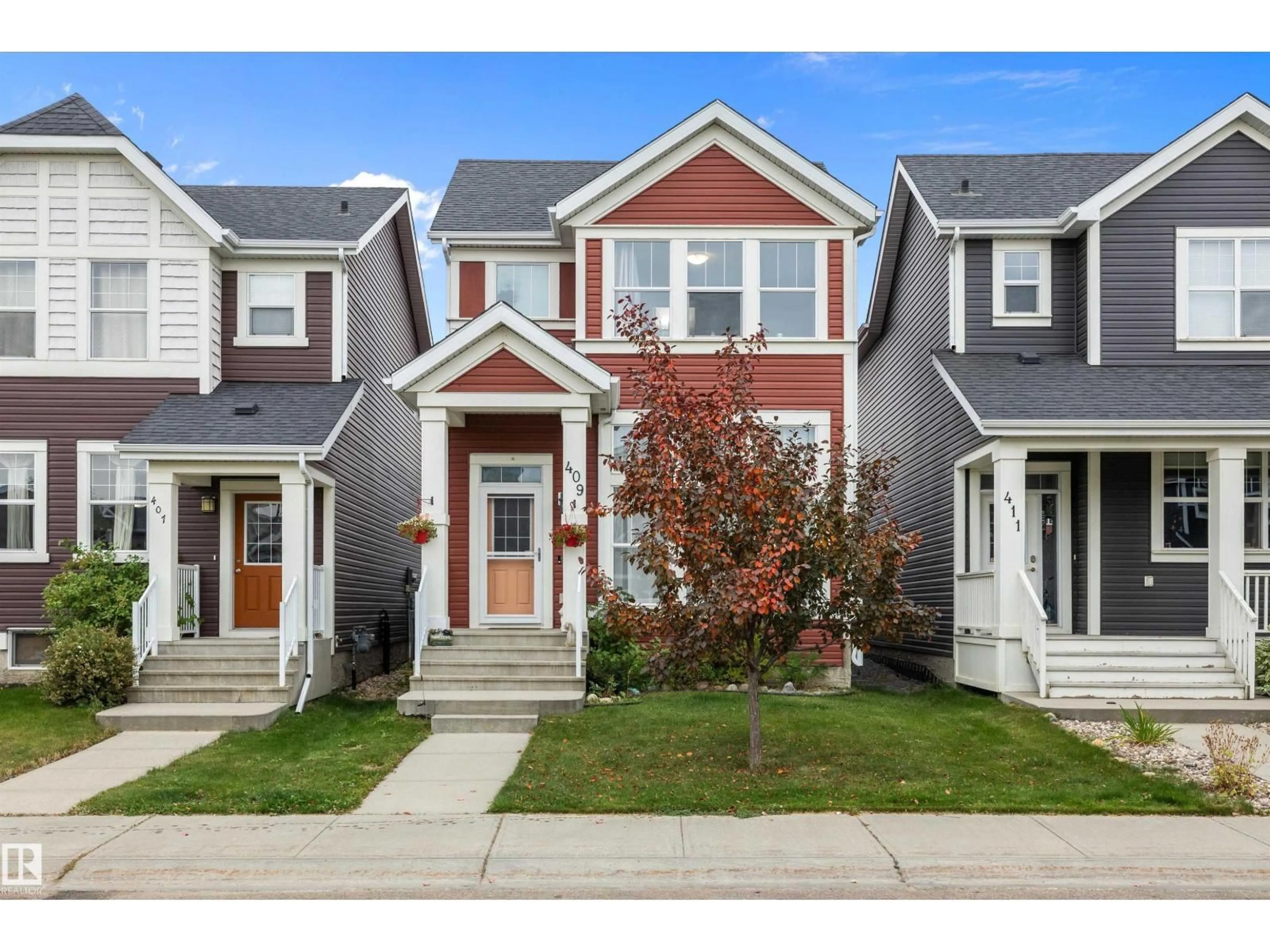 Home with vinyl exterior material, street for 409 SIMPKINS LI, Leduc Alberta T9E1B8