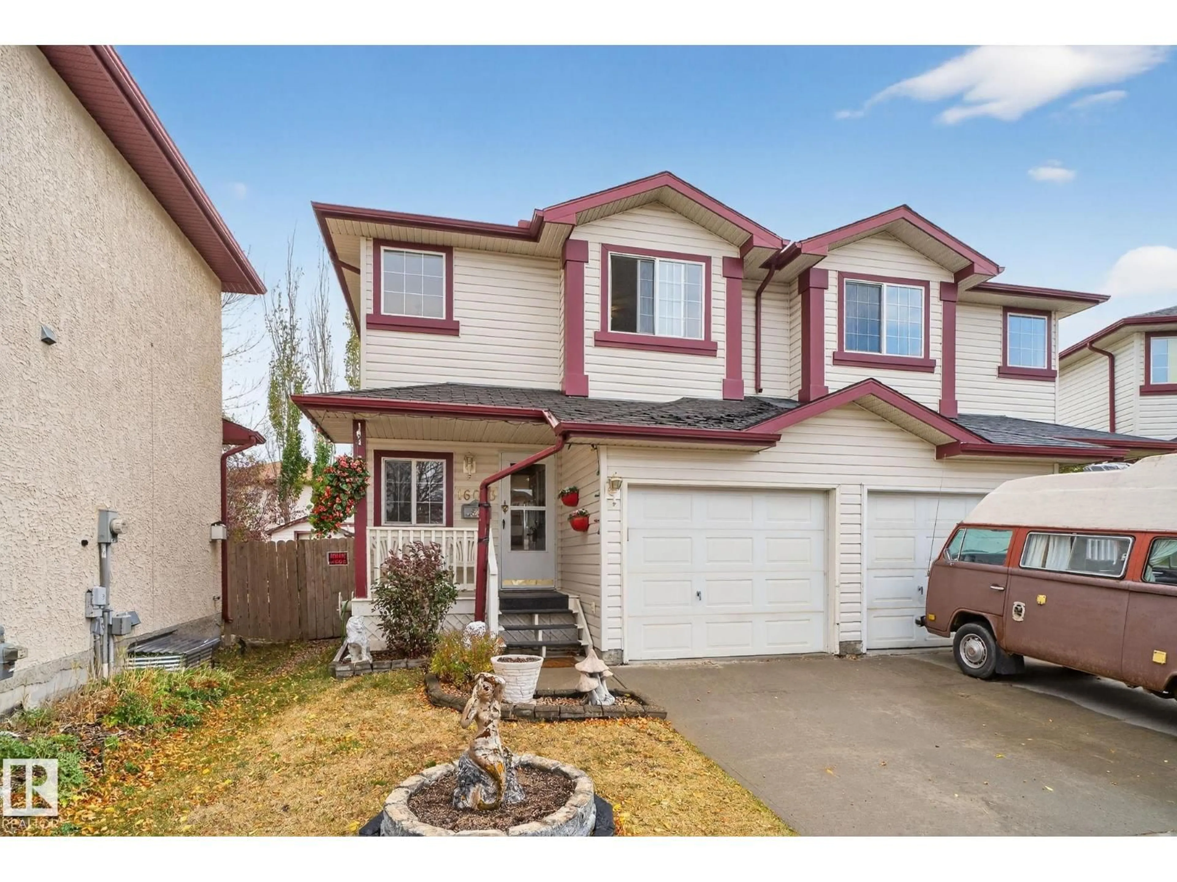 Home with vinyl exterior material, street for NW - 16013 90 ST, Edmonton Alberta T5Z3P6