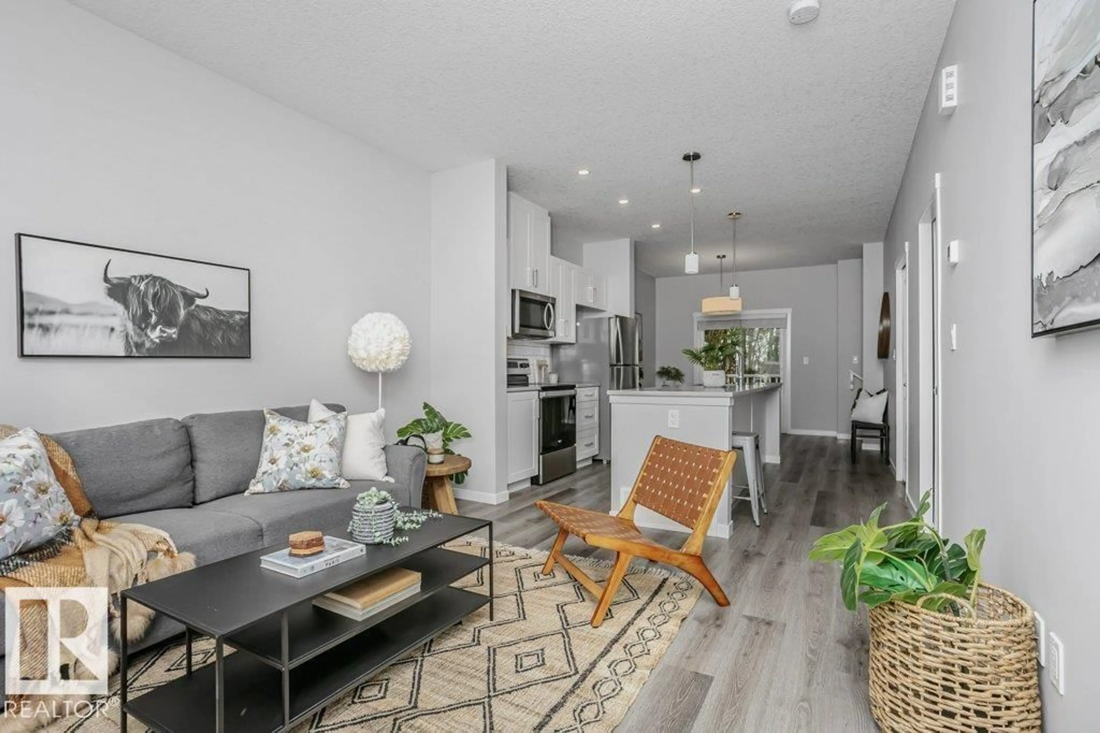 Living room with furniture, unknown for 320 - 52 SECORD BV, Edmonton Alberta T5T7E8