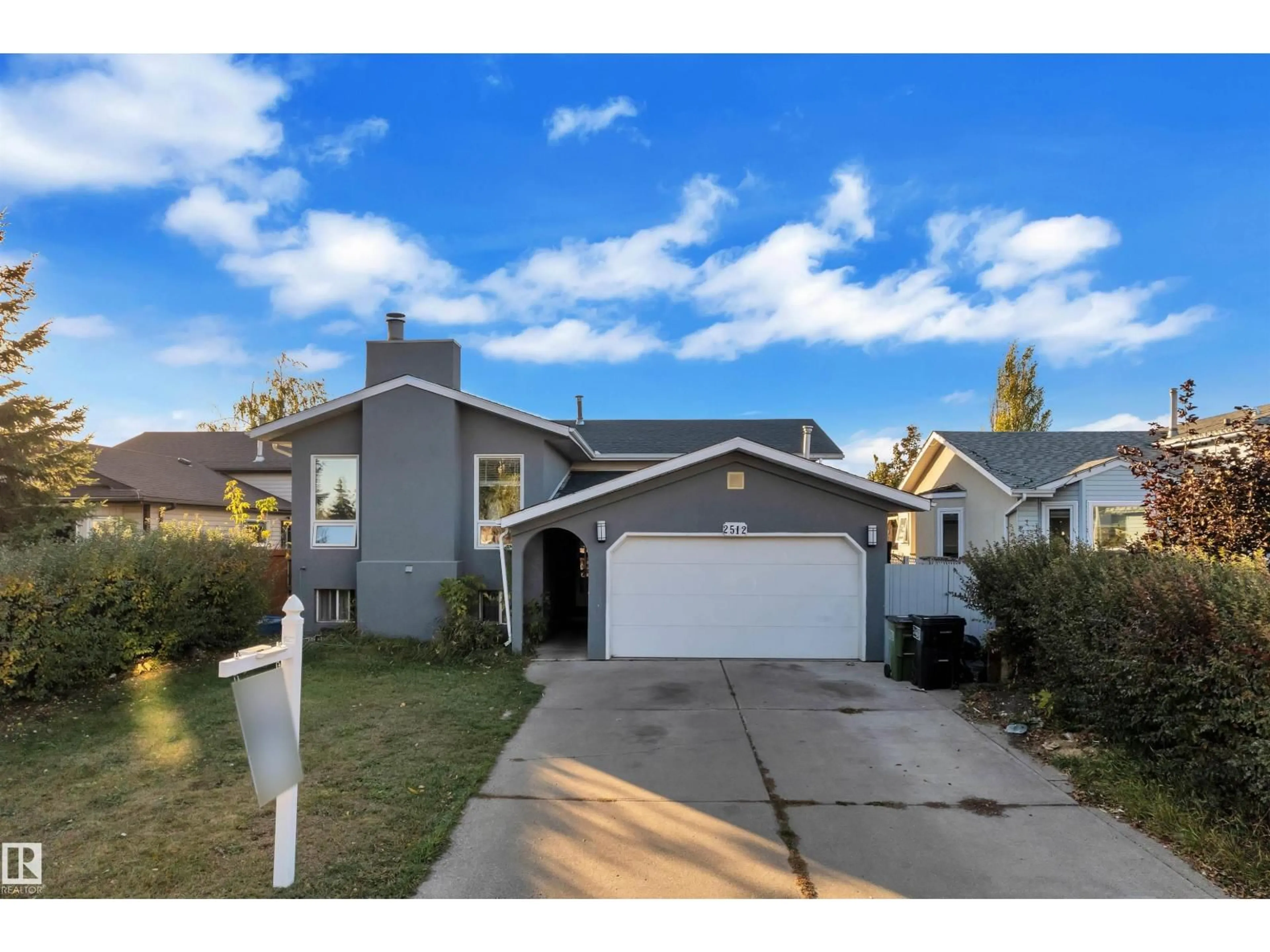 Home with vinyl exterior material, street for 2512 42 ST, Edmonton Alberta T5L4M8