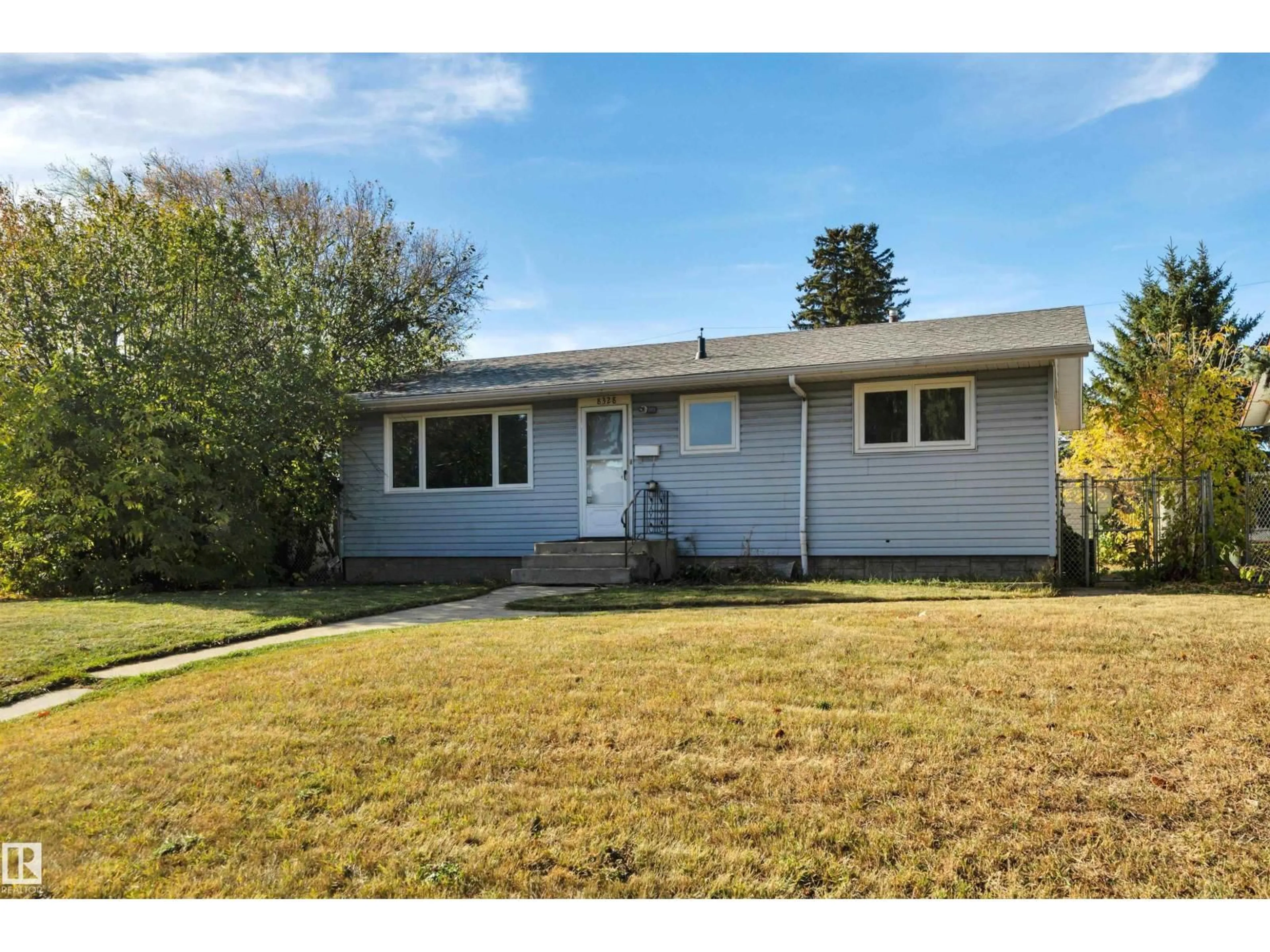 Home with vinyl exterior material, street for NW - 8328 165 ST, Edmonton Alberta T5R2R4