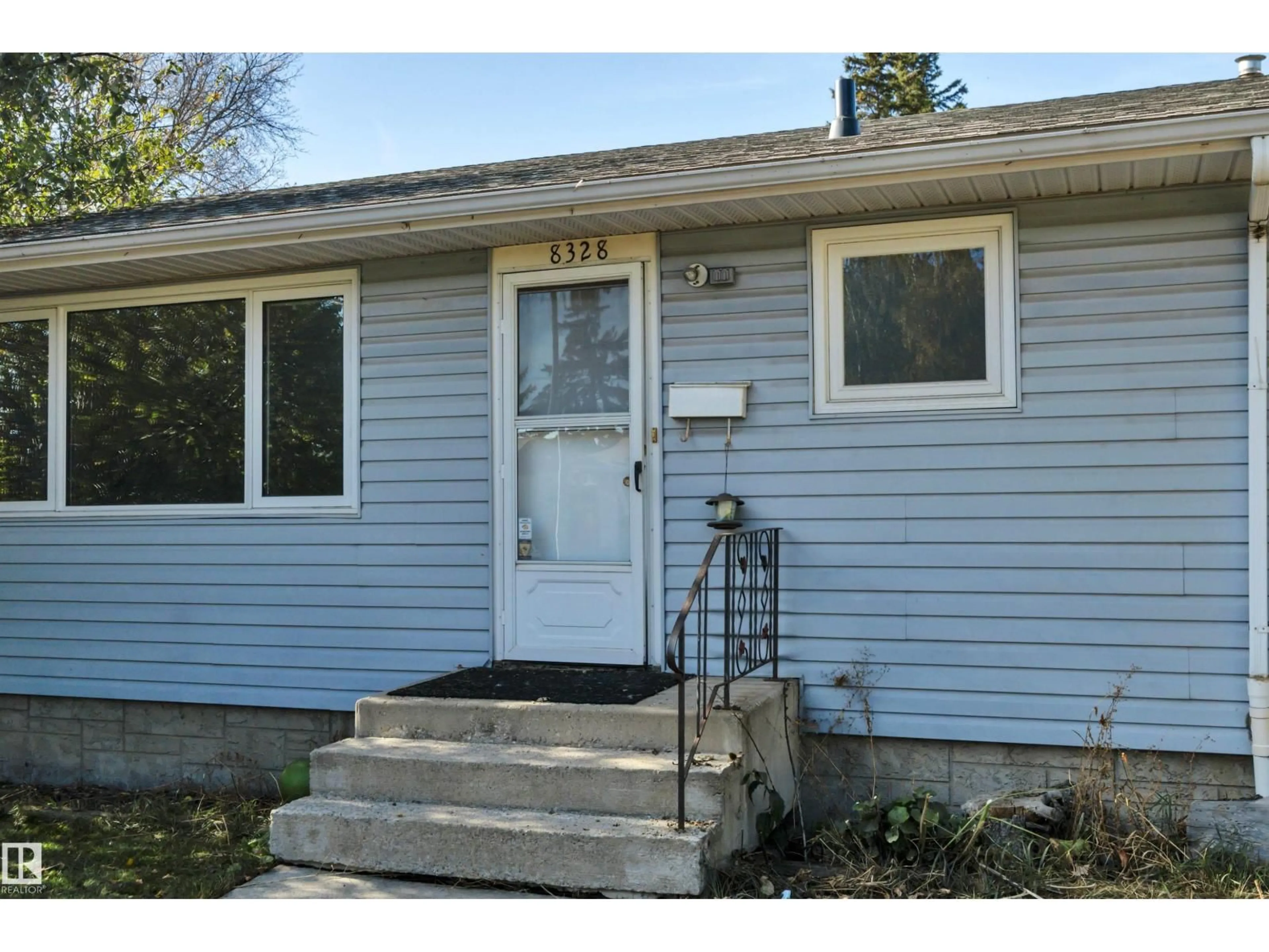 Home with vinyl exterior material, street for NW - 8328 165 ST, Edmonton Alberta T5R2R4