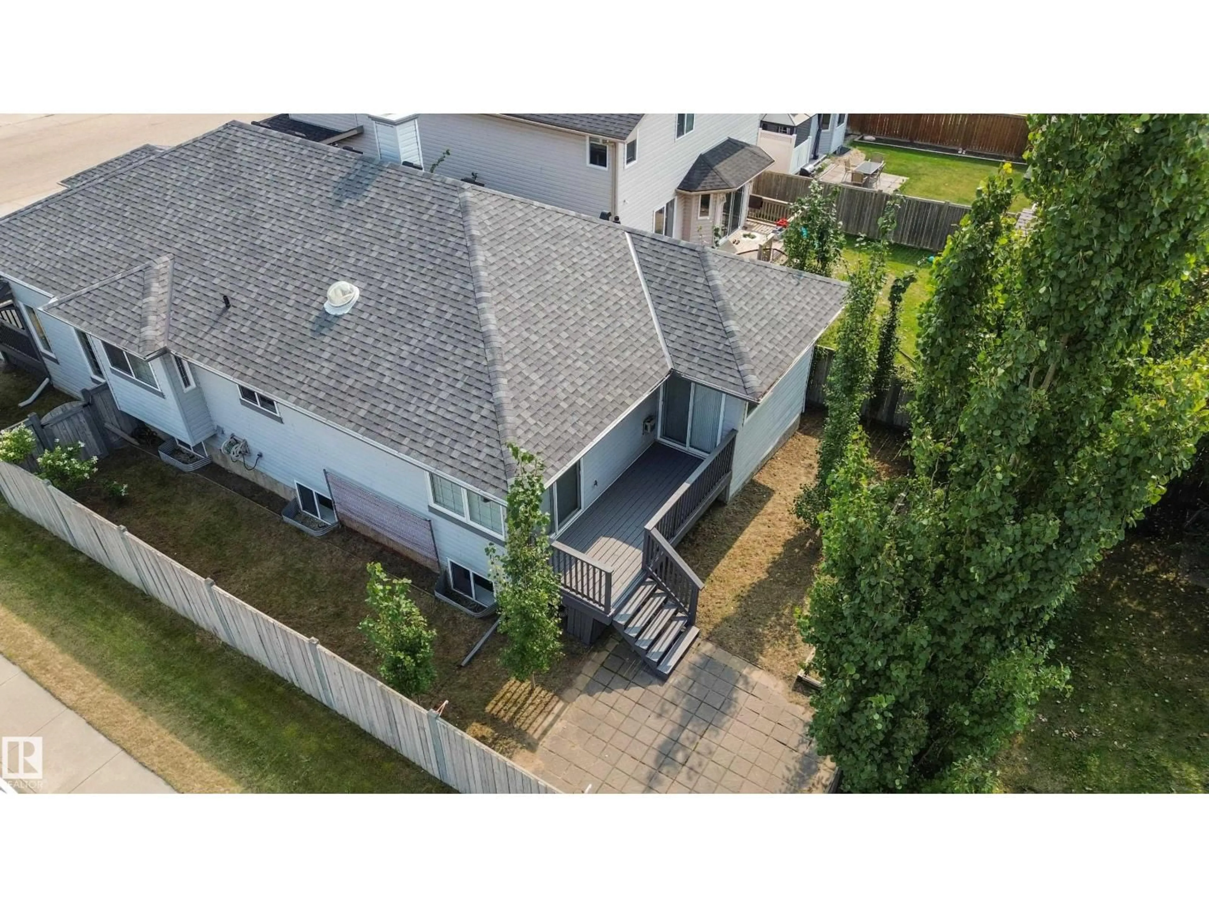 A pic from outside/outdoor area/front of a property/back of a property/a pic from drone, unknown for NW - 15216 49 ST, Edmonton Alberta T5Y3C1
