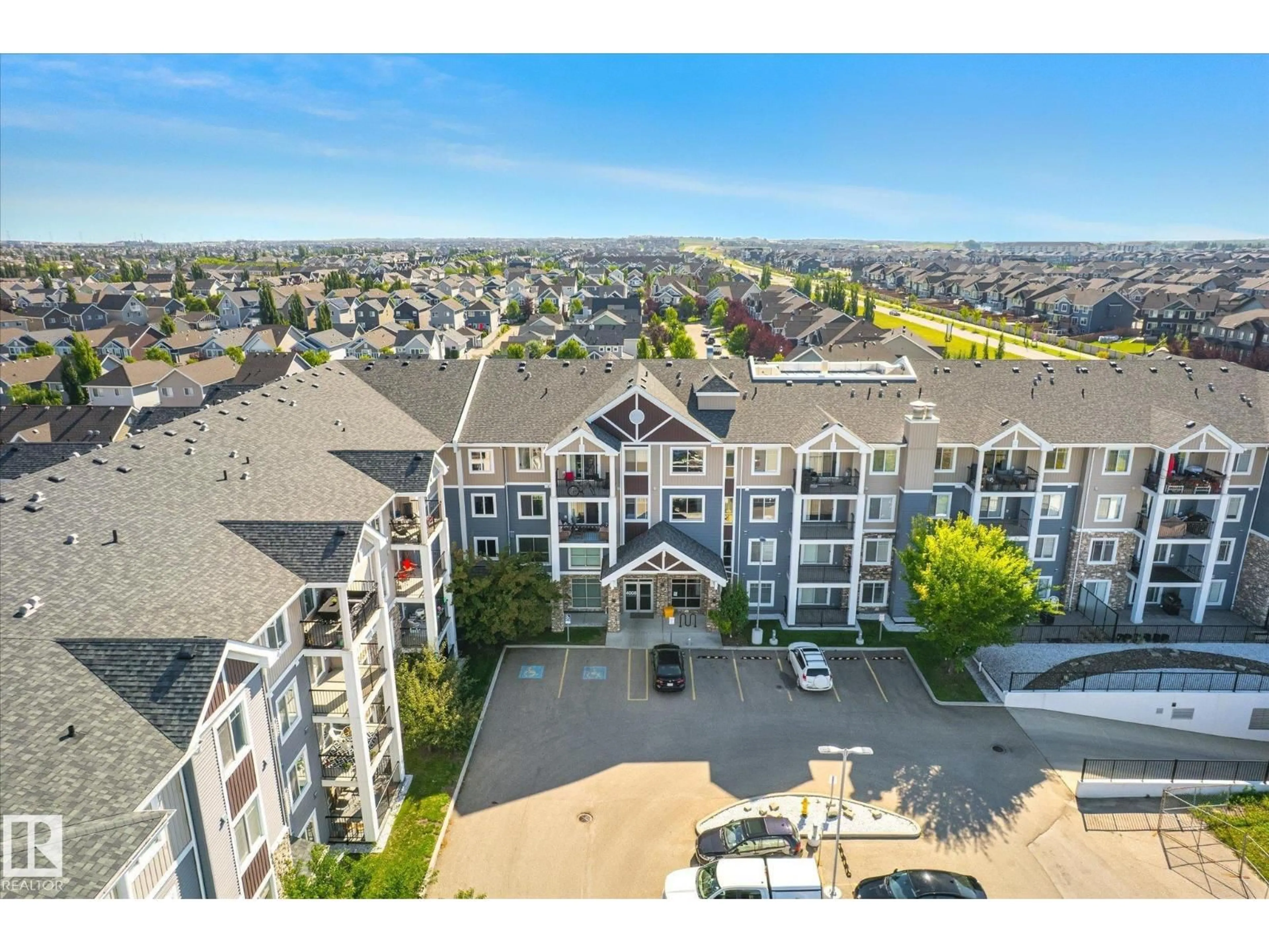 A pic from outside/outdoor area/front of a property/back of a property/a pic from drone, unknown for 316 - 4008 SAVARYN DR, Edmonton Alberta T6X2E5