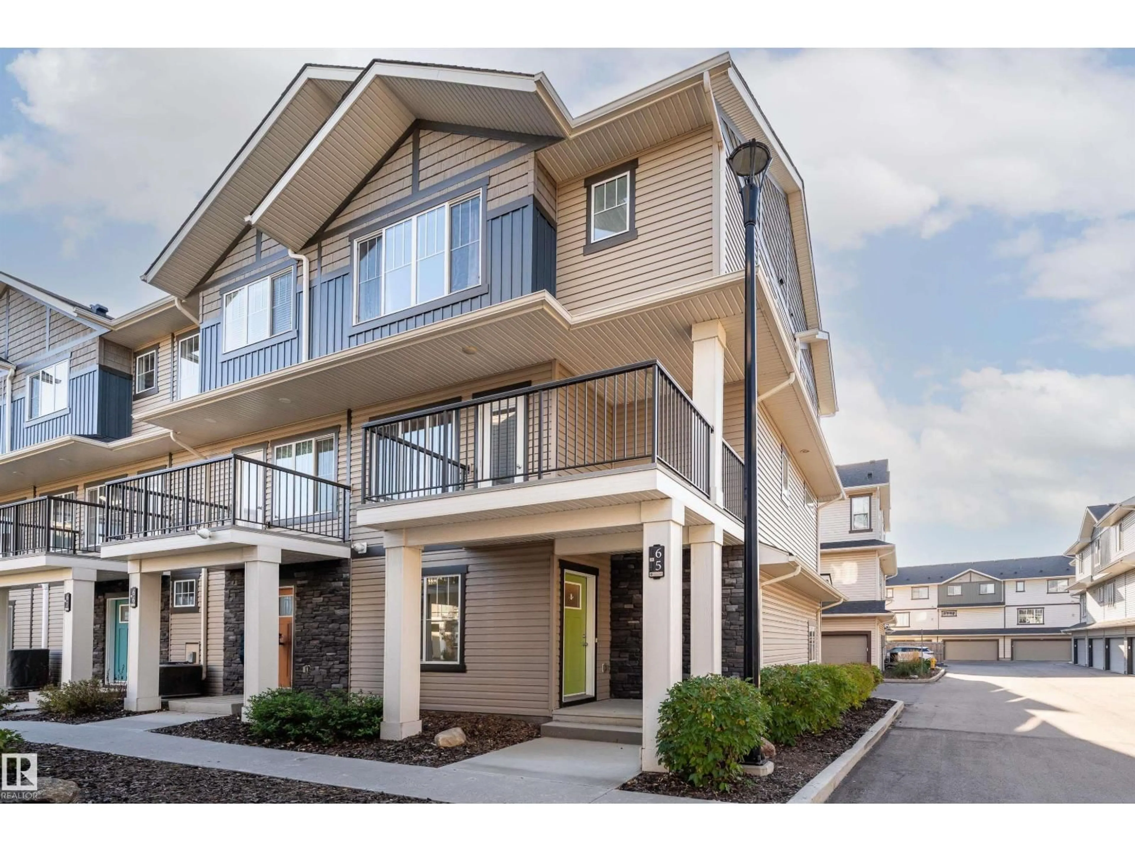 Home with vinyl exterior material, street for #65 - 165 CY BECKER BV, Edmonton Alberta T5Y3R4