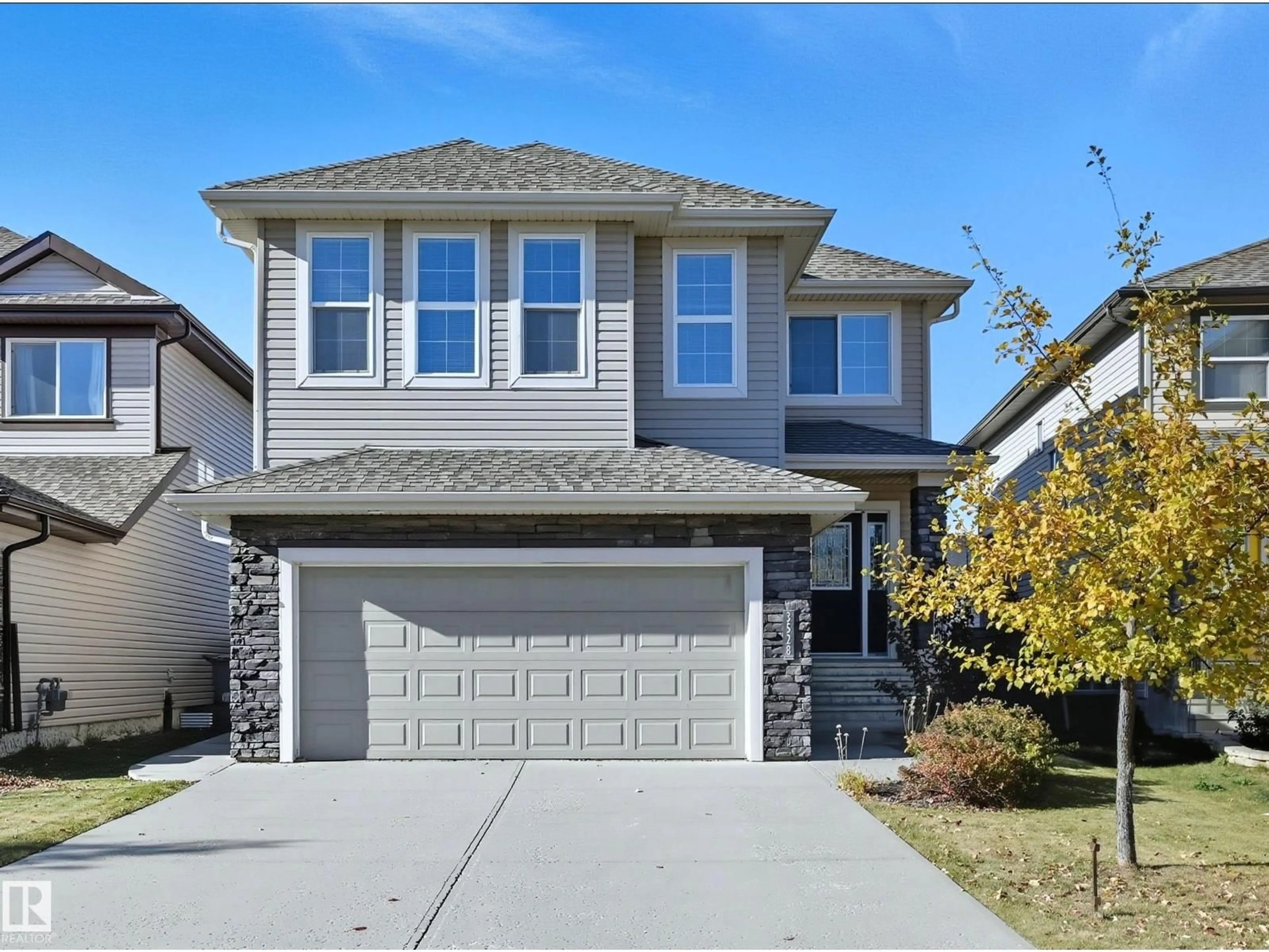 Home with vinyl exterior material, street for 3528 CLAXTON CR, Edmonton Alberta T6W0Z6