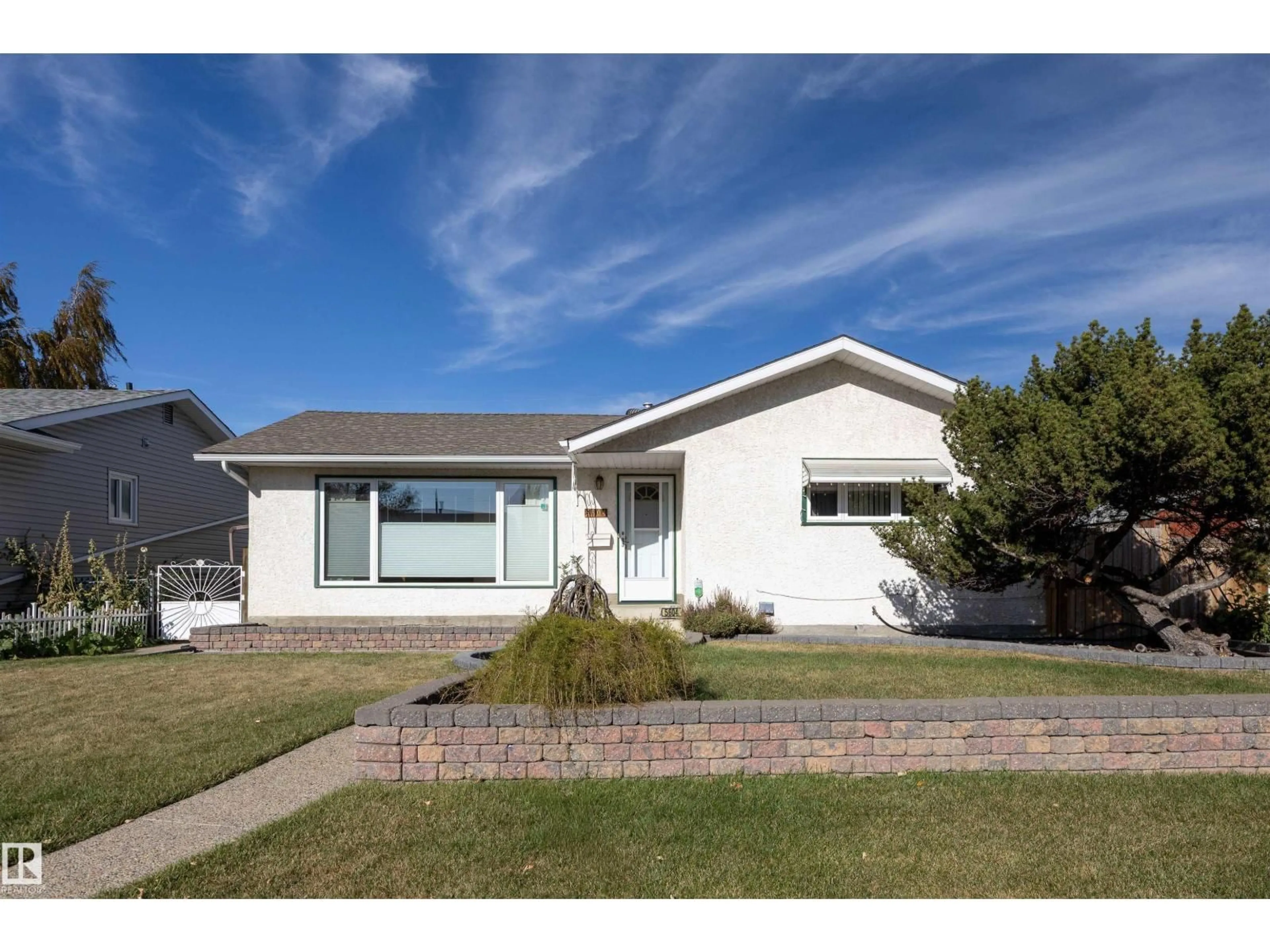Home with vinyl exterior material, street for 5604 94A AV, Edmonton Alberta T6B0Y5