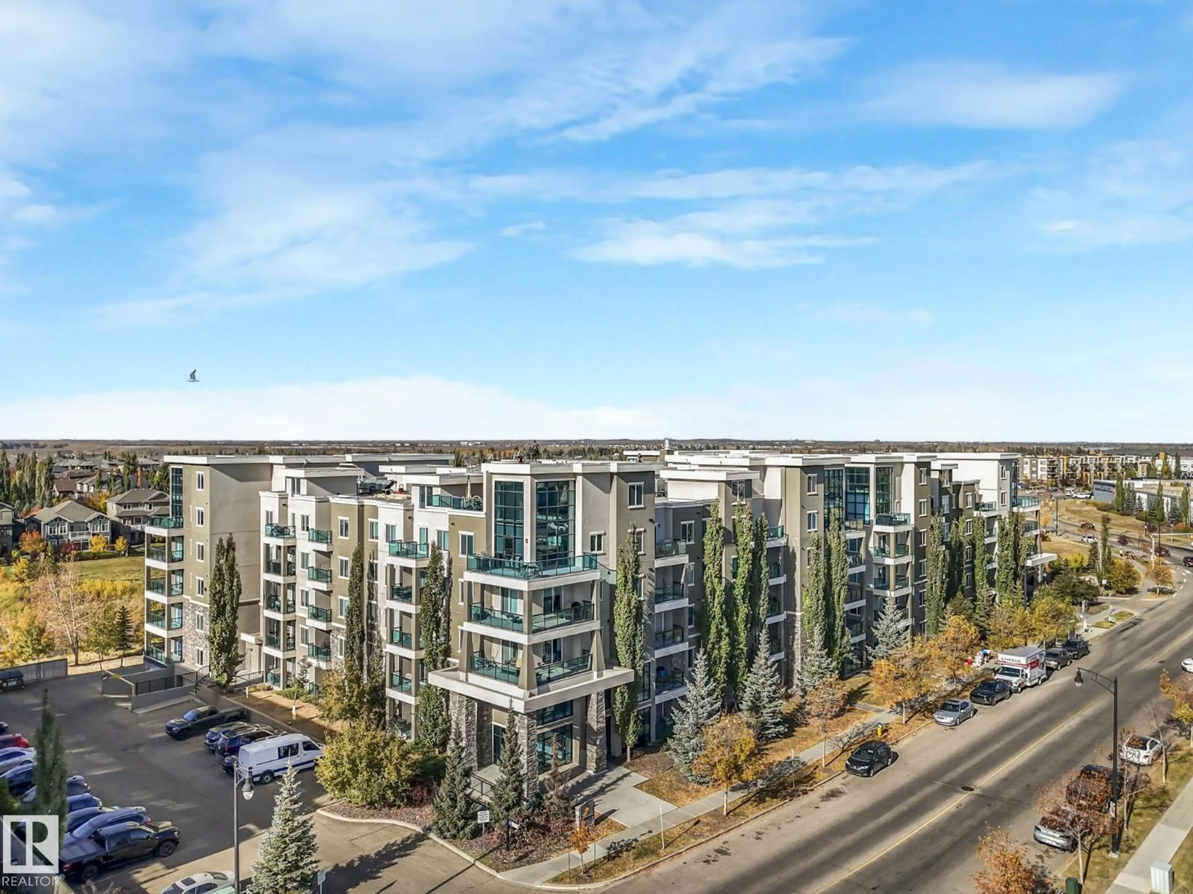 A pic from outside/outdoor area/front of a property/back of a property/a pic from drone, city buildings view from balcony for #212 - 1238 WINDERMERE WY, Edmonton Alberta T6W2J3