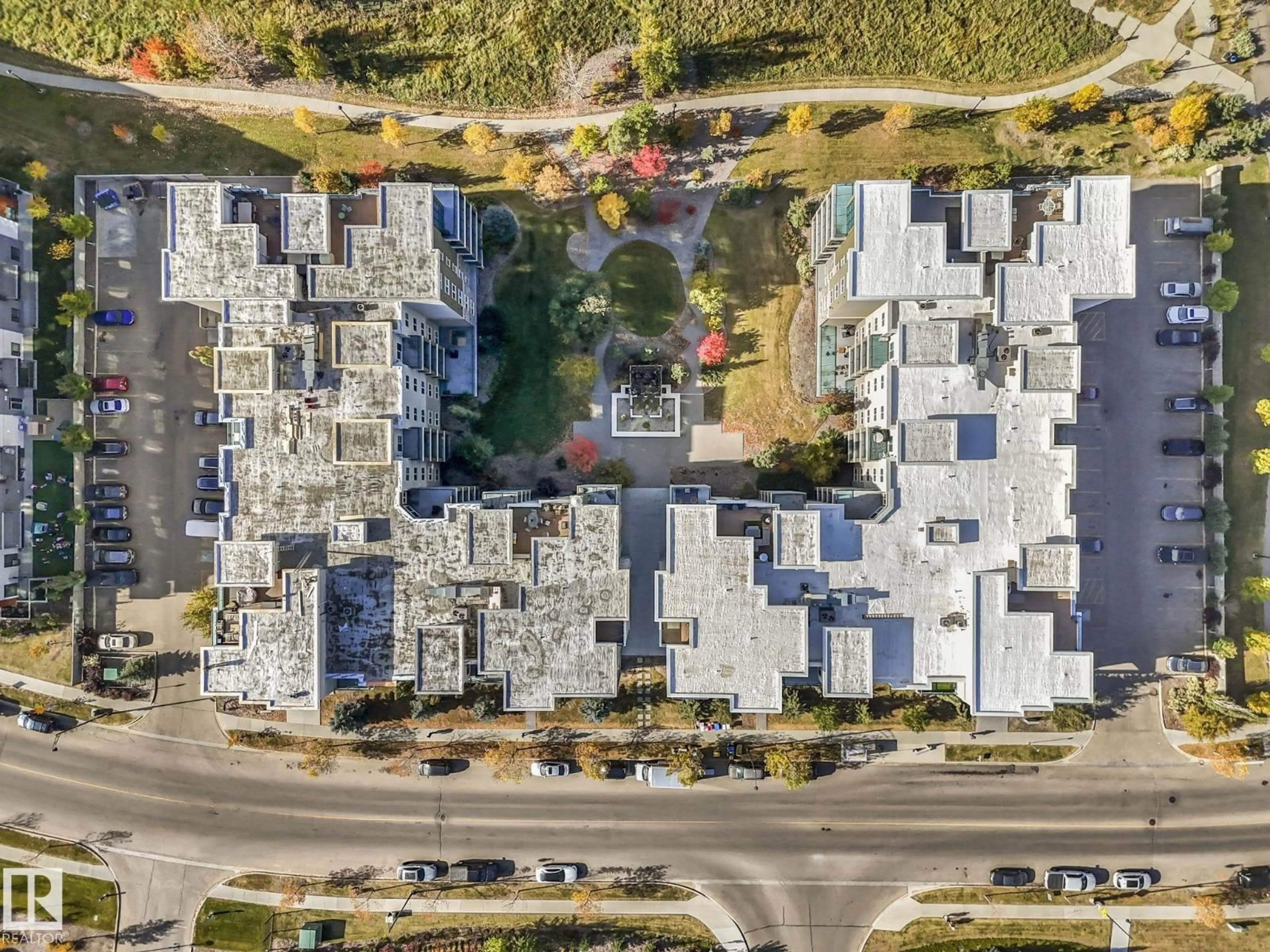 A pic from outside/outdoor area/front of a property/back of a property/a pic from drone, street for #212 - 1238 WINDERMERE WY, Edmonton Alberta T6W2J3