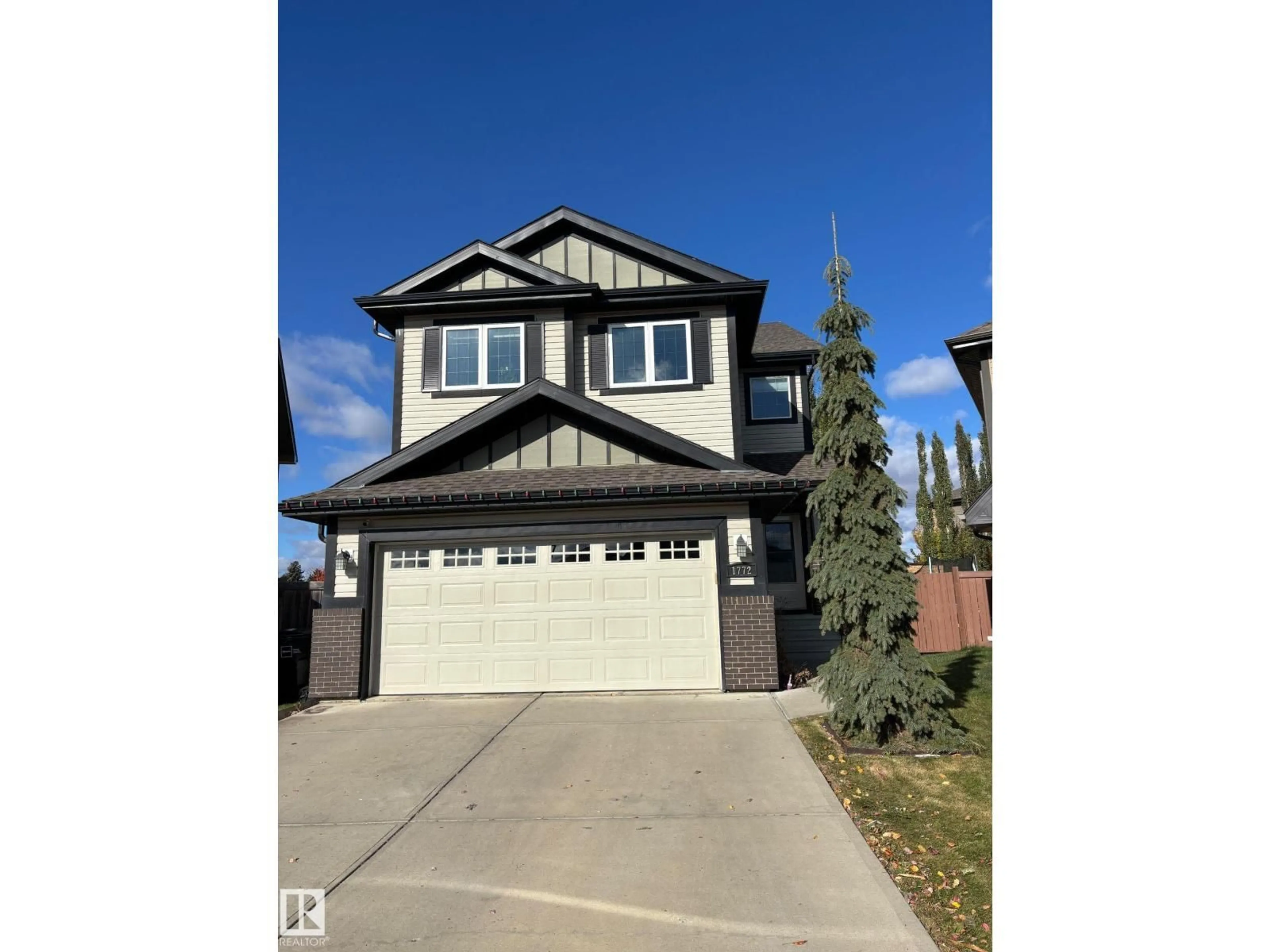 Home with vinyl exterior material, street for NW - 1772 33B ST, Edmonton Alberta T6T0P3