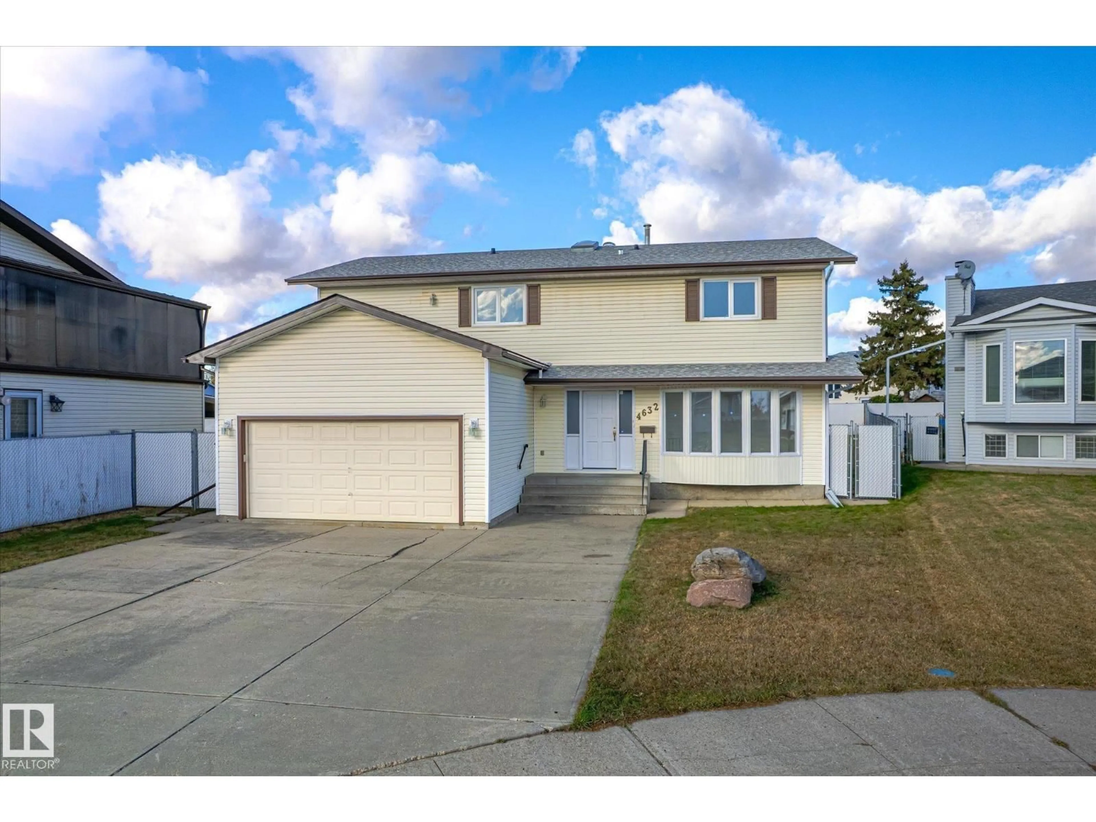 Home with vinyl exterior material, street for 4632 126 AVENUE, Edmonton Alberta T5A4K9