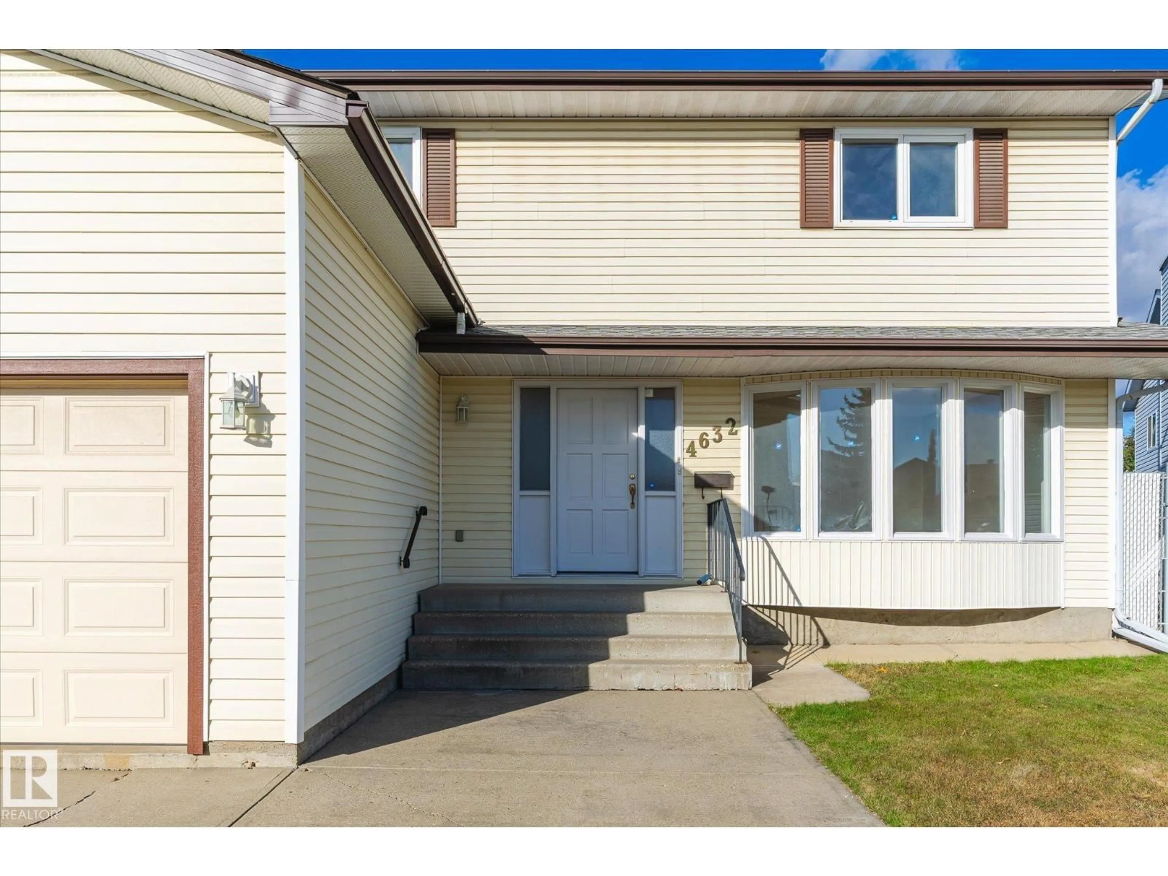 Home with vinyl exterior material, street for 4632 126 AVENUE, Edmonton Alberta T5A4K9