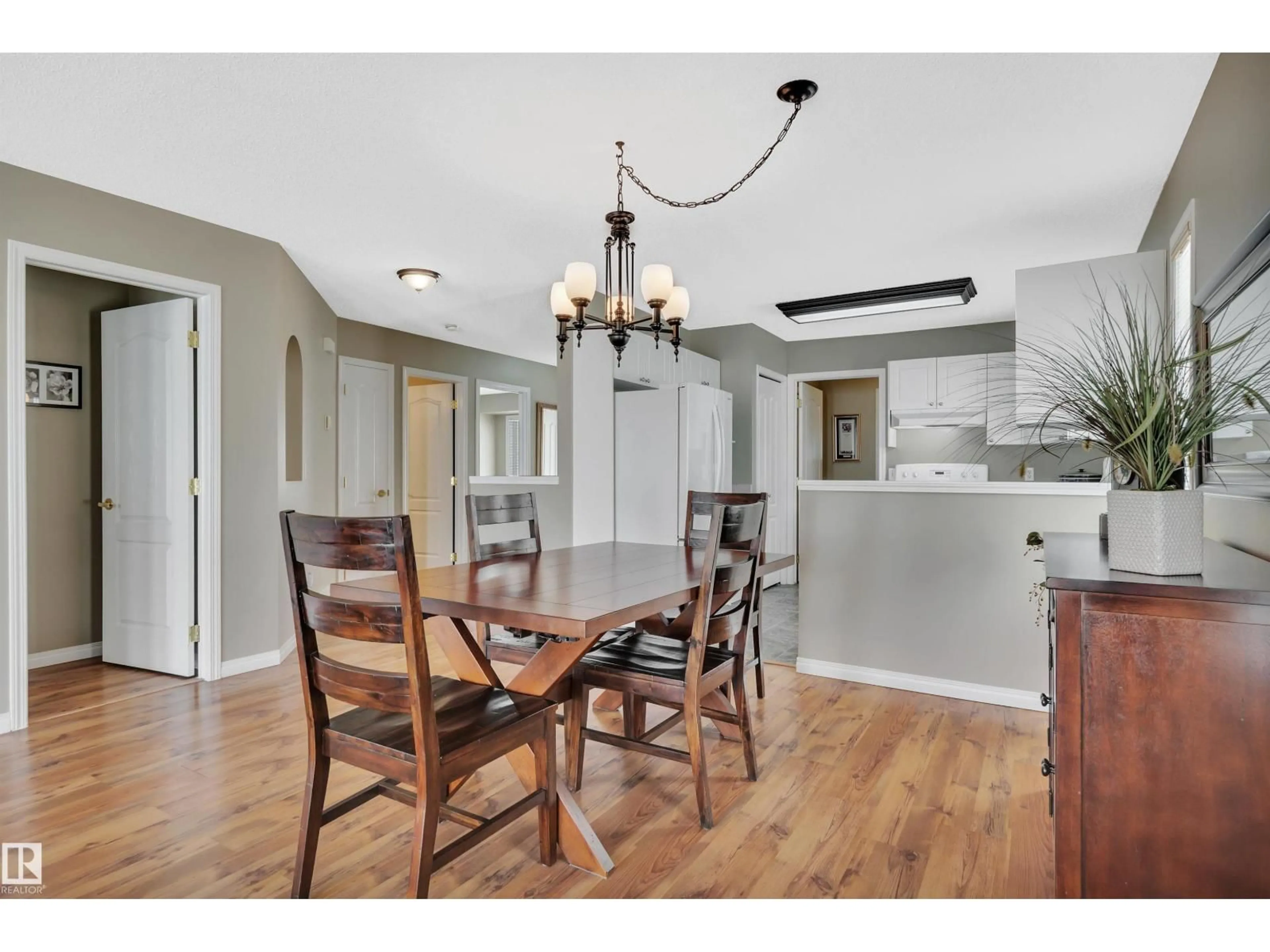 Dining room, wood/laminate floor for 14428 MILLER BV, Edmonton Alberta T5Y2Y6