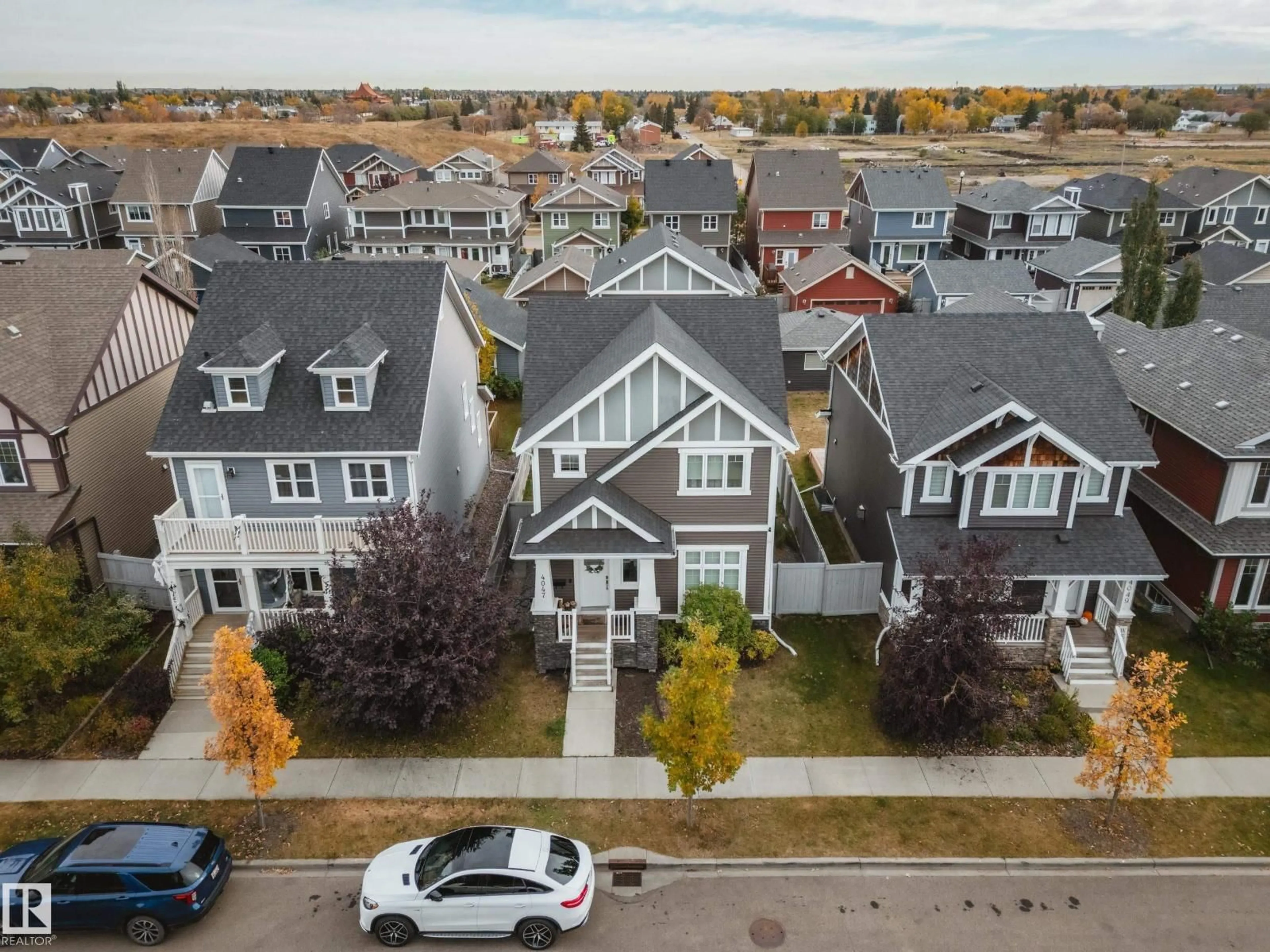 A pic from outside/outdoor area/front of a property/back of a property/a pic from drone, street for 4047 MORRISON WY, Edmonton Alberta T5E6S7