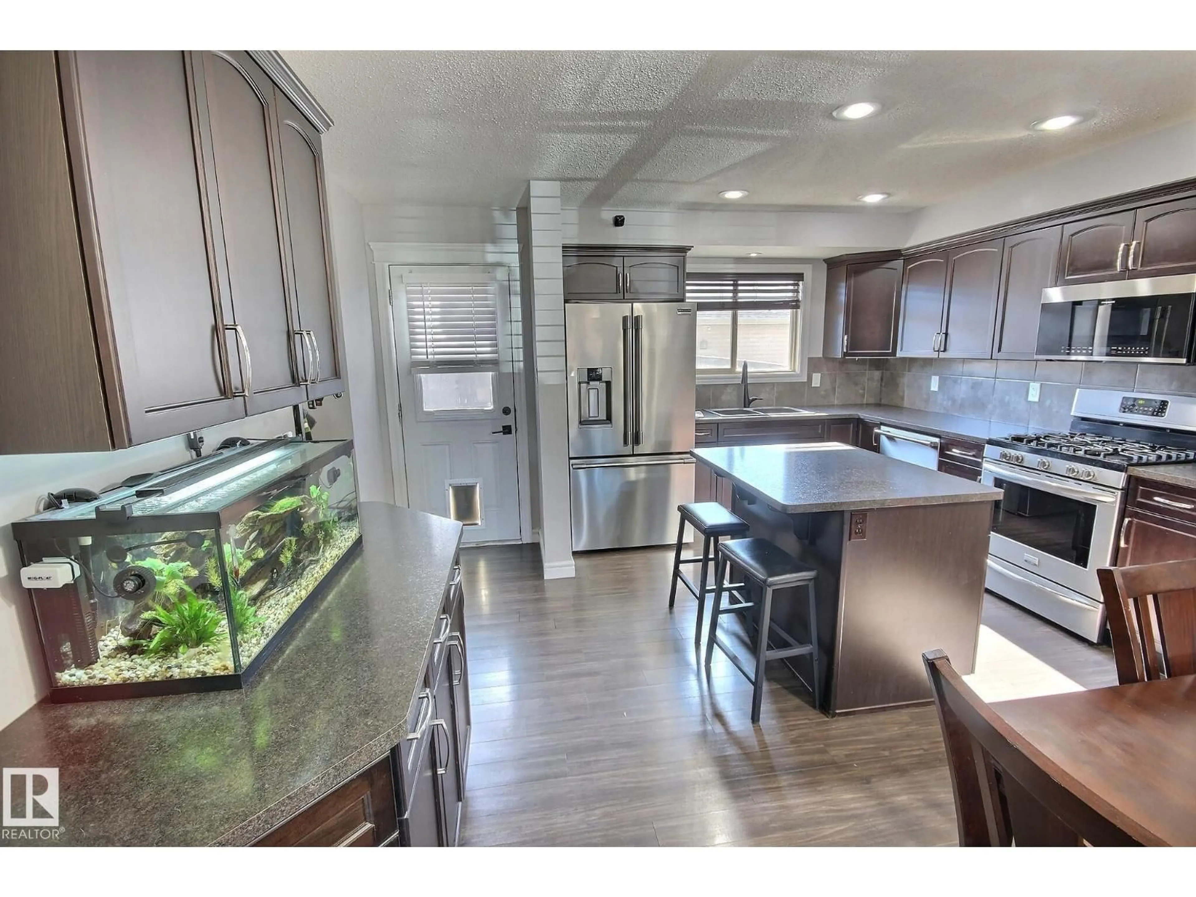 Open concept kitchen, ceramic/tile floor for 351 NELSON DR, Spruce Grove Alberta T7X0N9