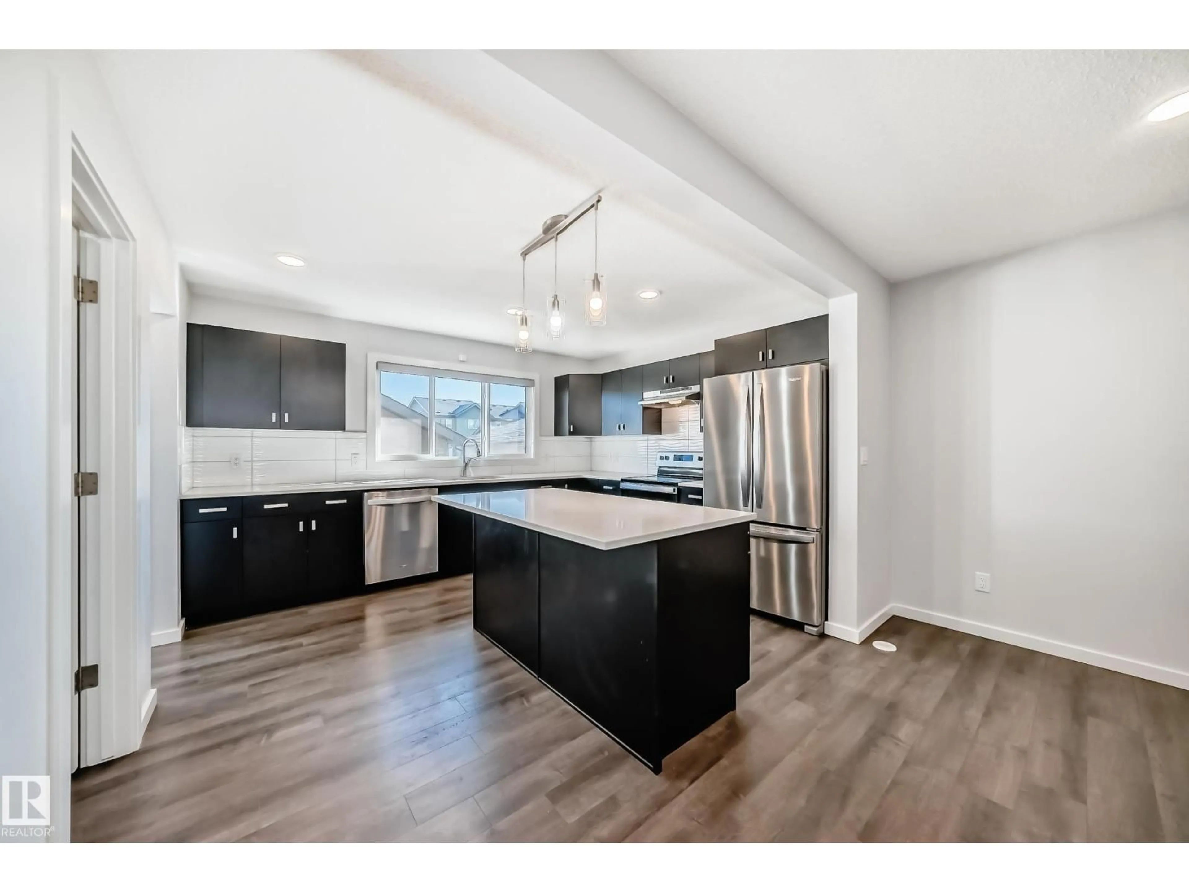 Open concept kitchen, unknown for 8723 221 ST, Edmonton Alberta T5T7H7