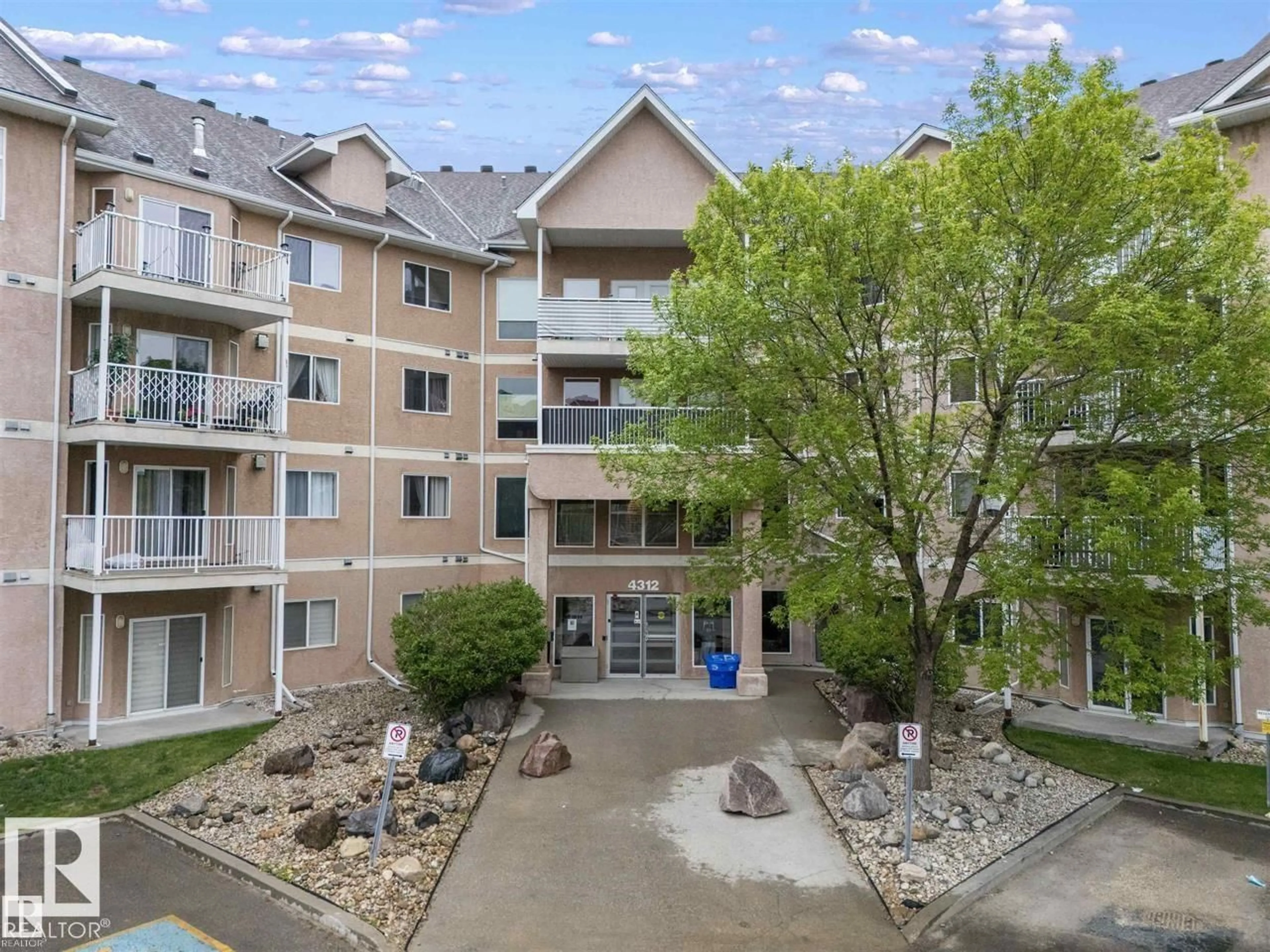 A pic from outside/outdoor area/front of a property/back of a property/a pic from drone, unknown for 310 - 4312 139 AV, Edmonton Alberta T5Y3J4