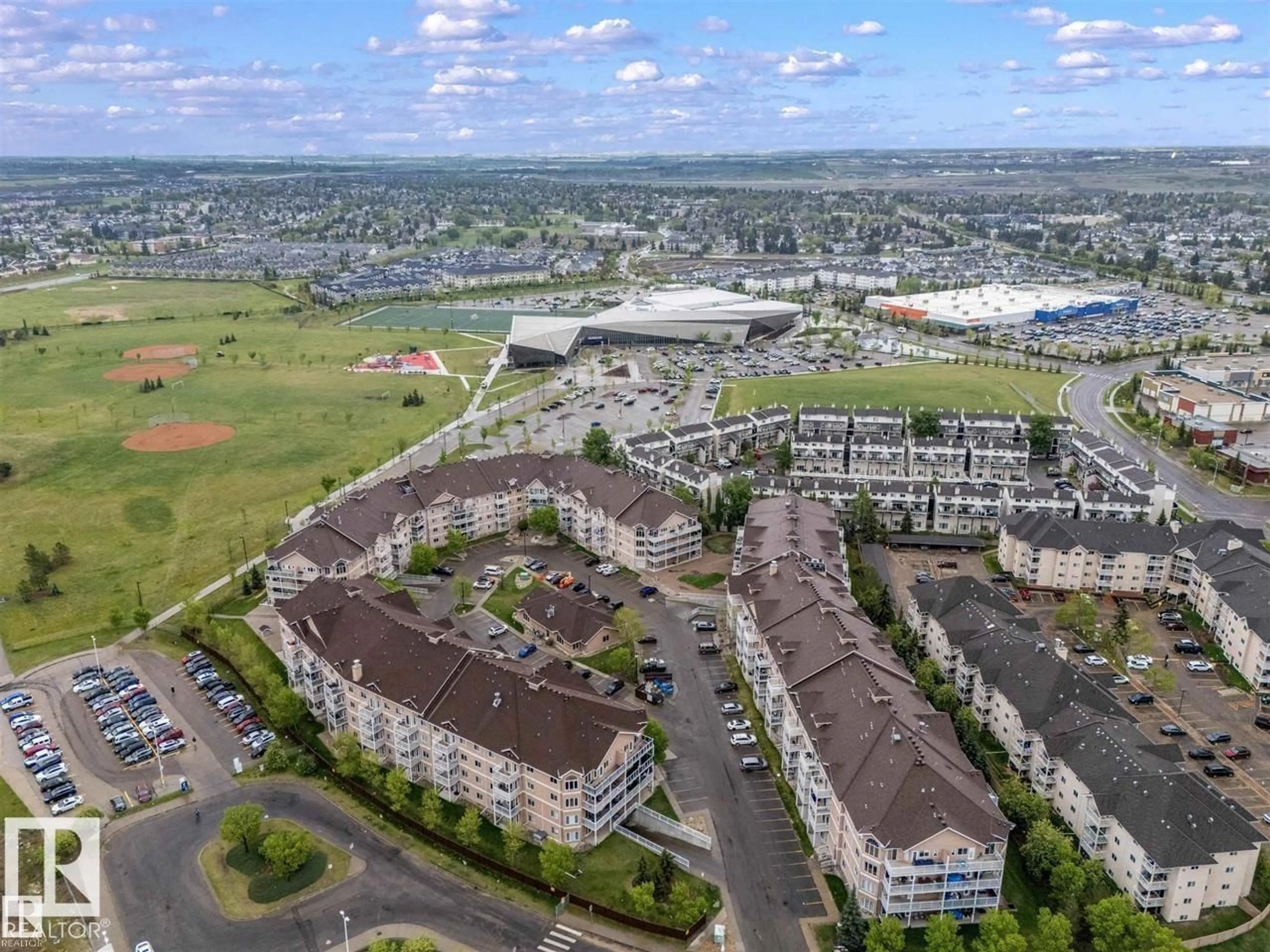 A pic from outside/outdoor area/front of a property/back of a property/a pic from drone, unknown for 310 - 4312 139 AV, Edmonton Alberta T5Y3J4