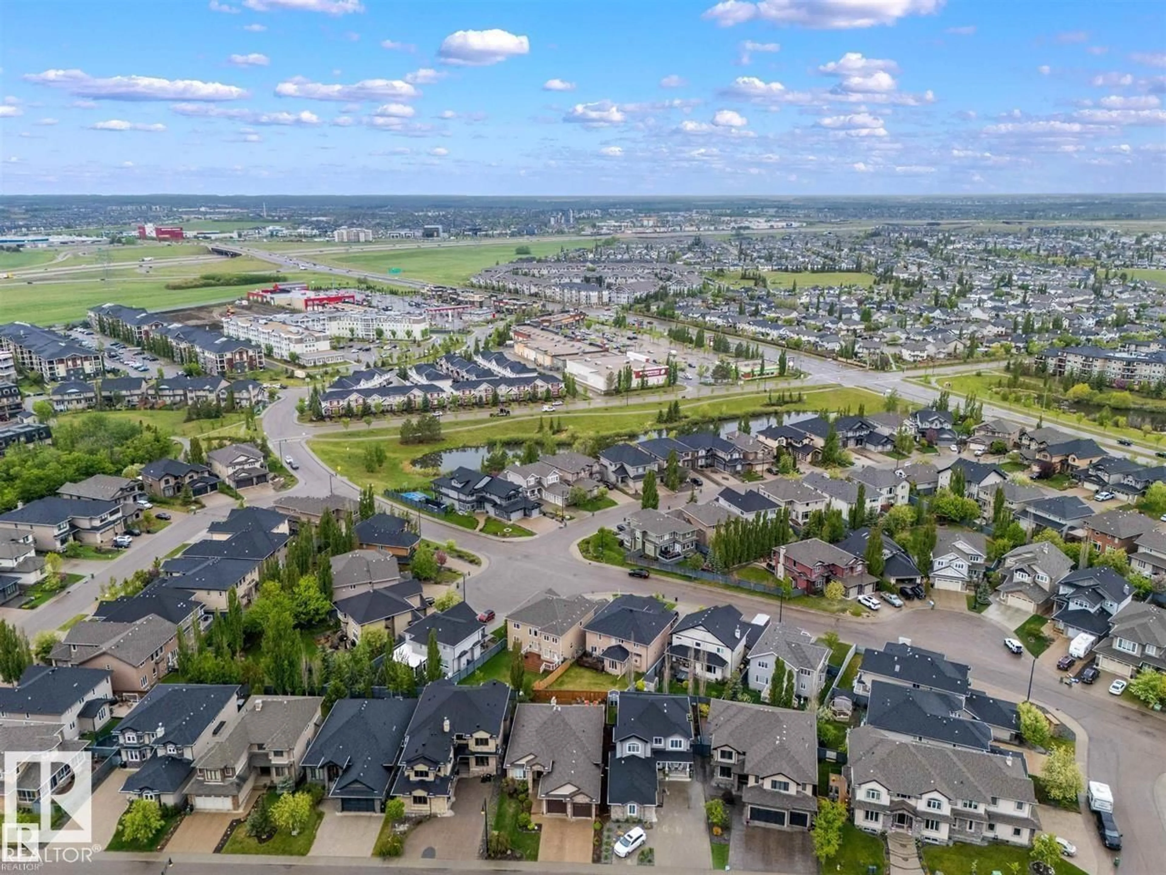 A pic from outside/outdoor area/front of a property/back of a property/a pic from drone, unknown for 310 - 4312 139 AV, Edmonton Alberta T5Y3J4