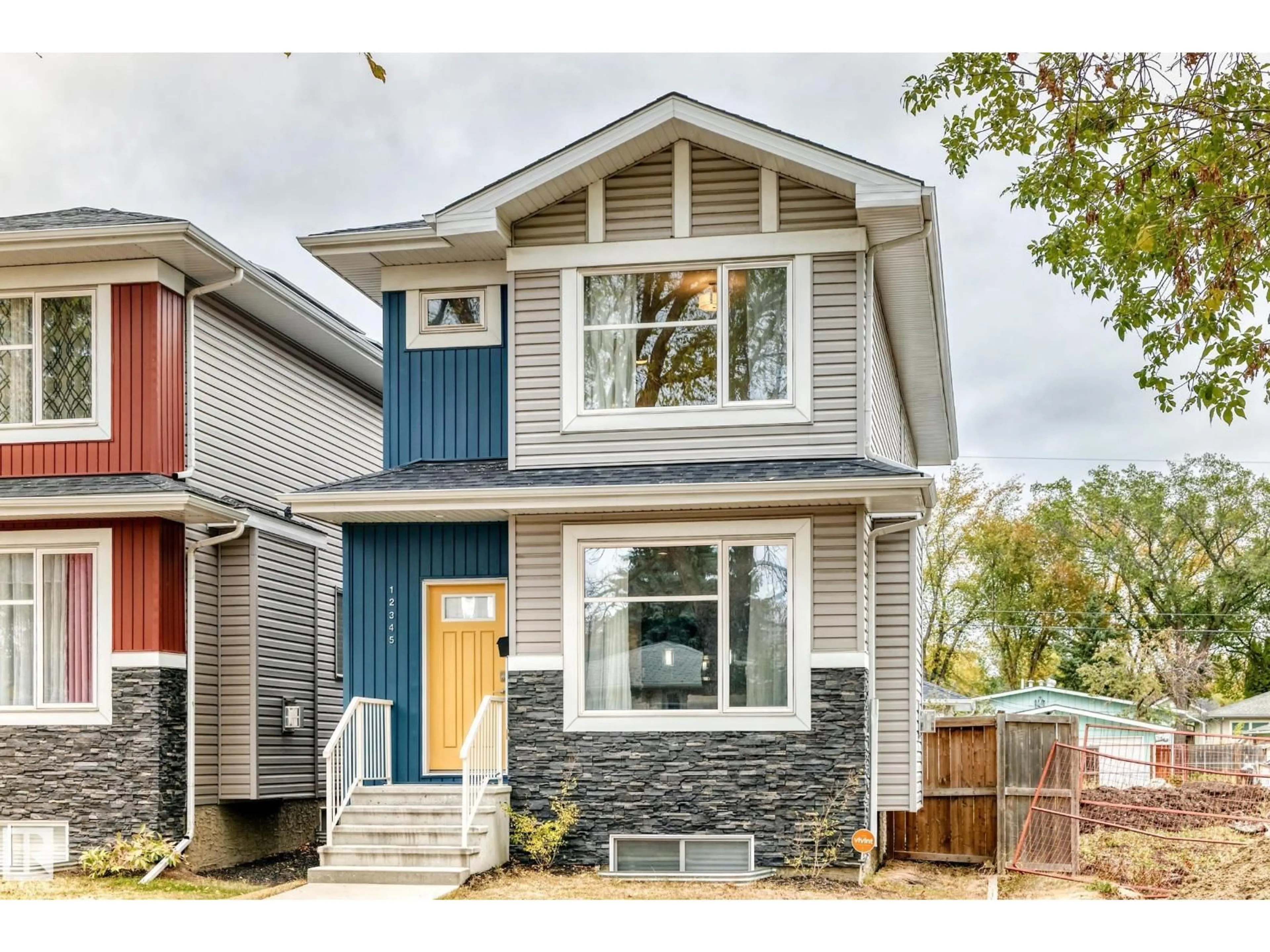 Home with vinyl exterior material, street for NW - 12345 85 ST, Edmonton Alberta T5B3H1