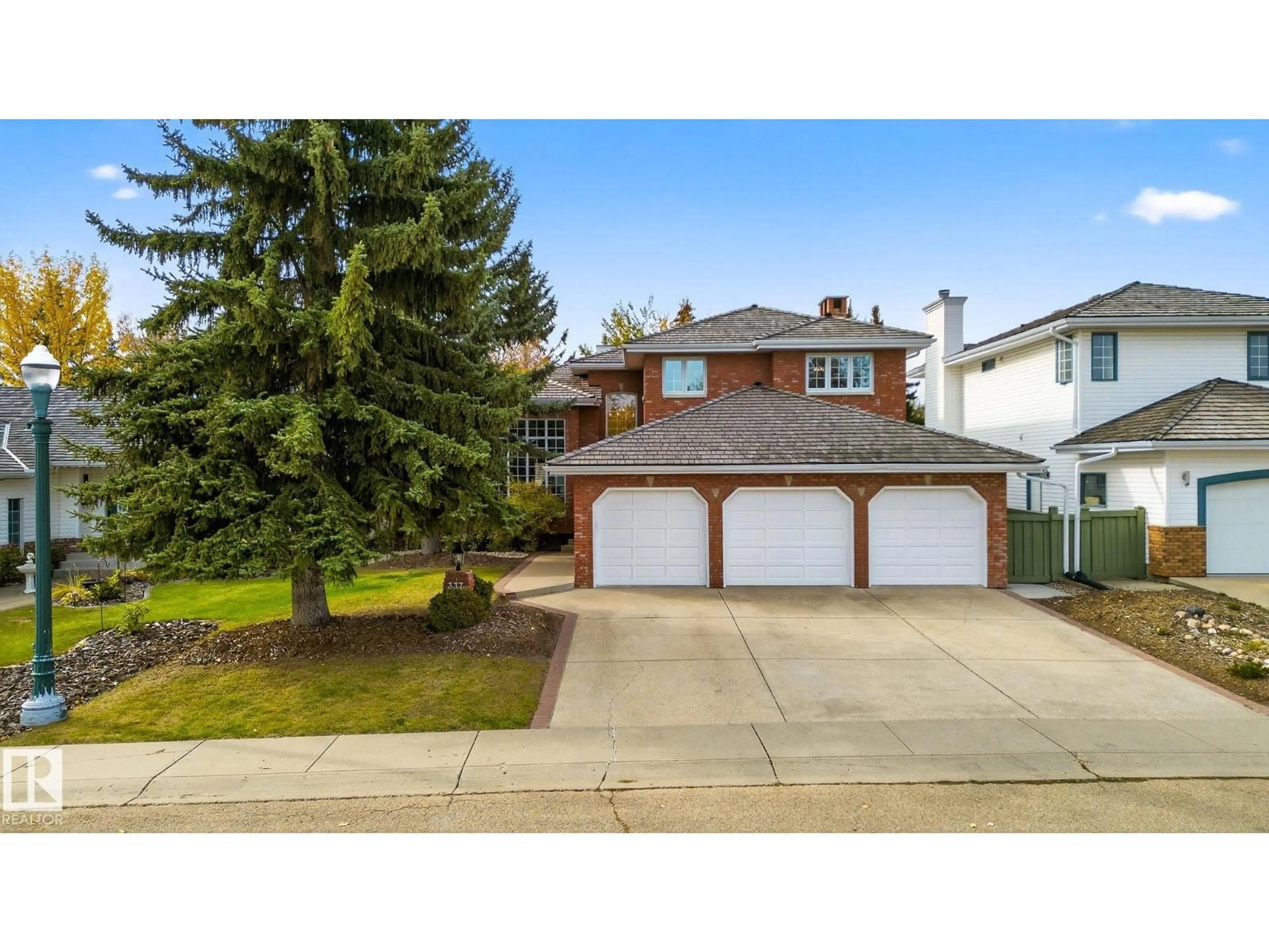 Home with vinyl exterior material, street for 337 WEBER WY, Edmonton Alberta T6M2H3