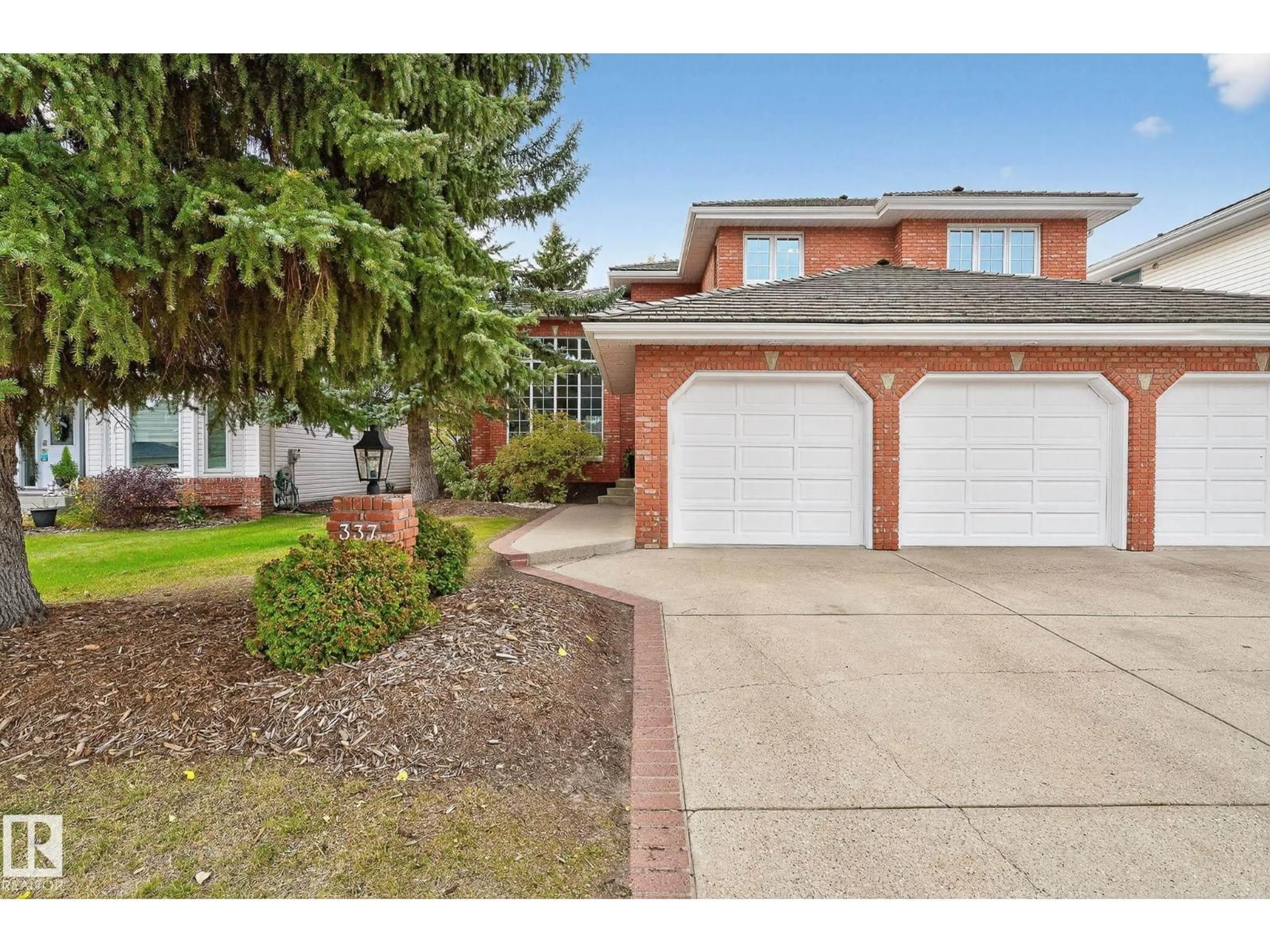 Home with brick exterior material, street for 337 WEBER WY, Edmonton Alberta T6M2H3