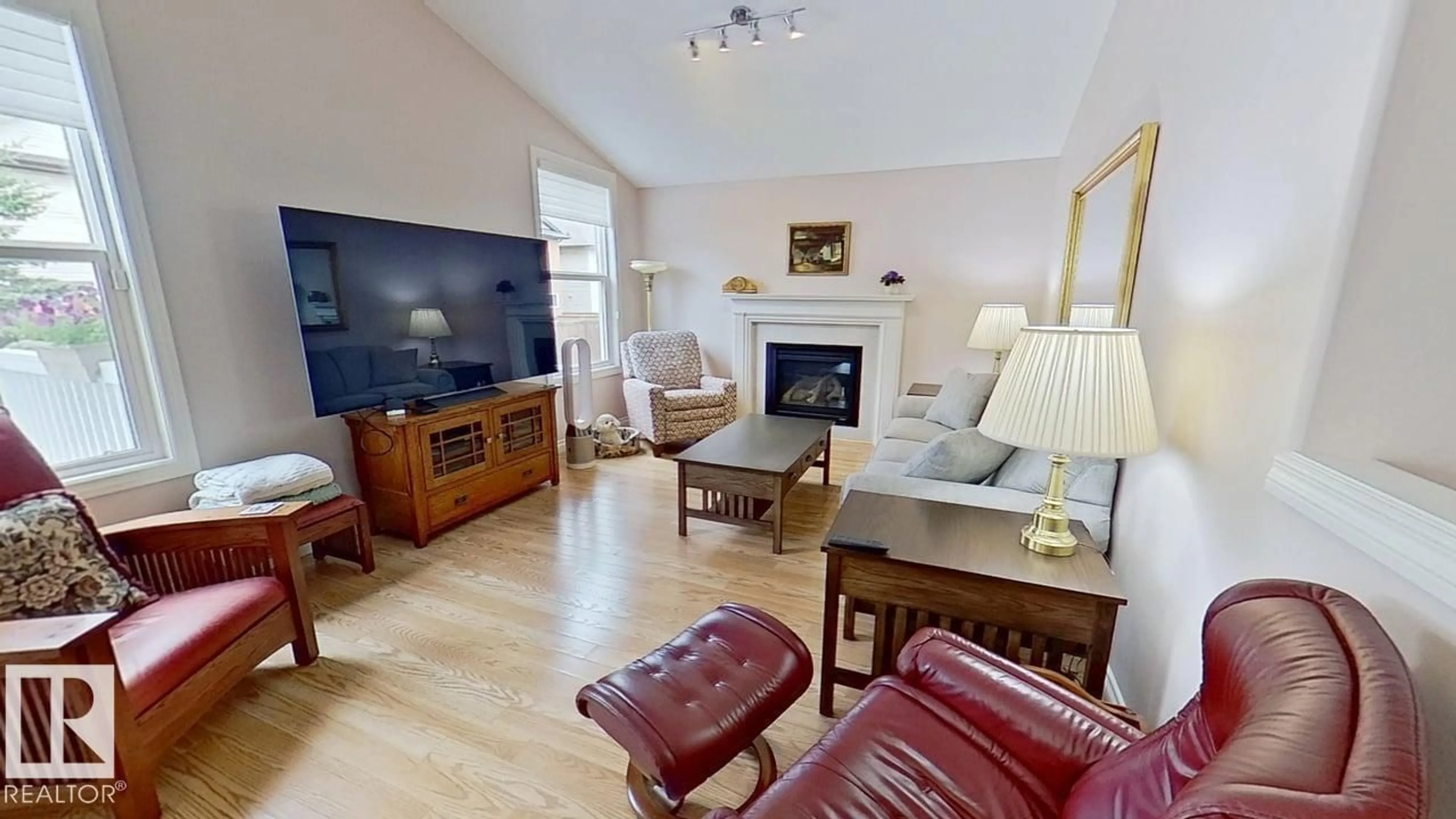 Living room with furniture, wood/laminate floor for NW - 13040 164 AV, Edmonton Alberta T6V0E7