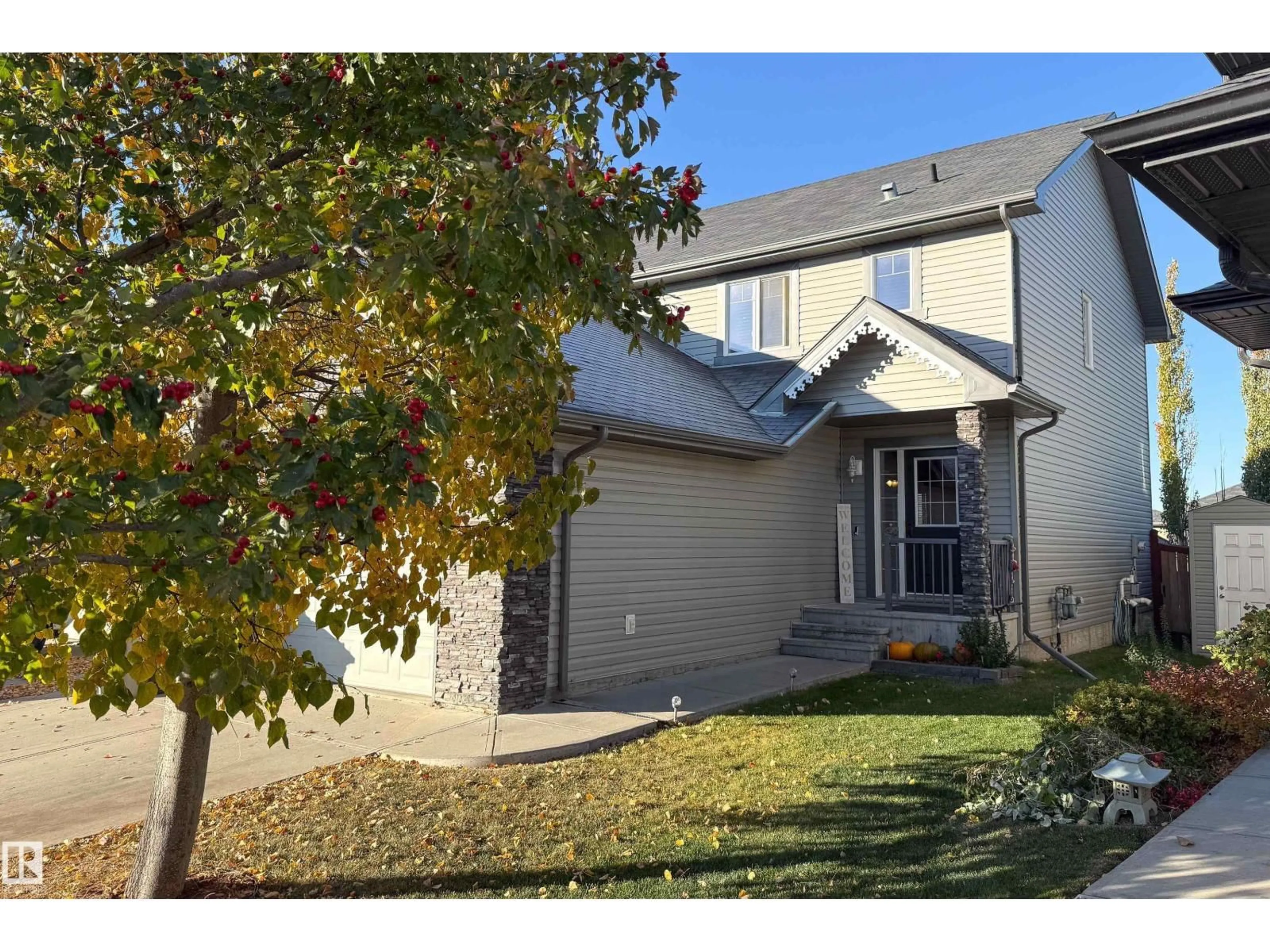 Home with vinyl exterior material, street for 173 RUE MONIQUE, Beaumont Alberta T4Z0A1