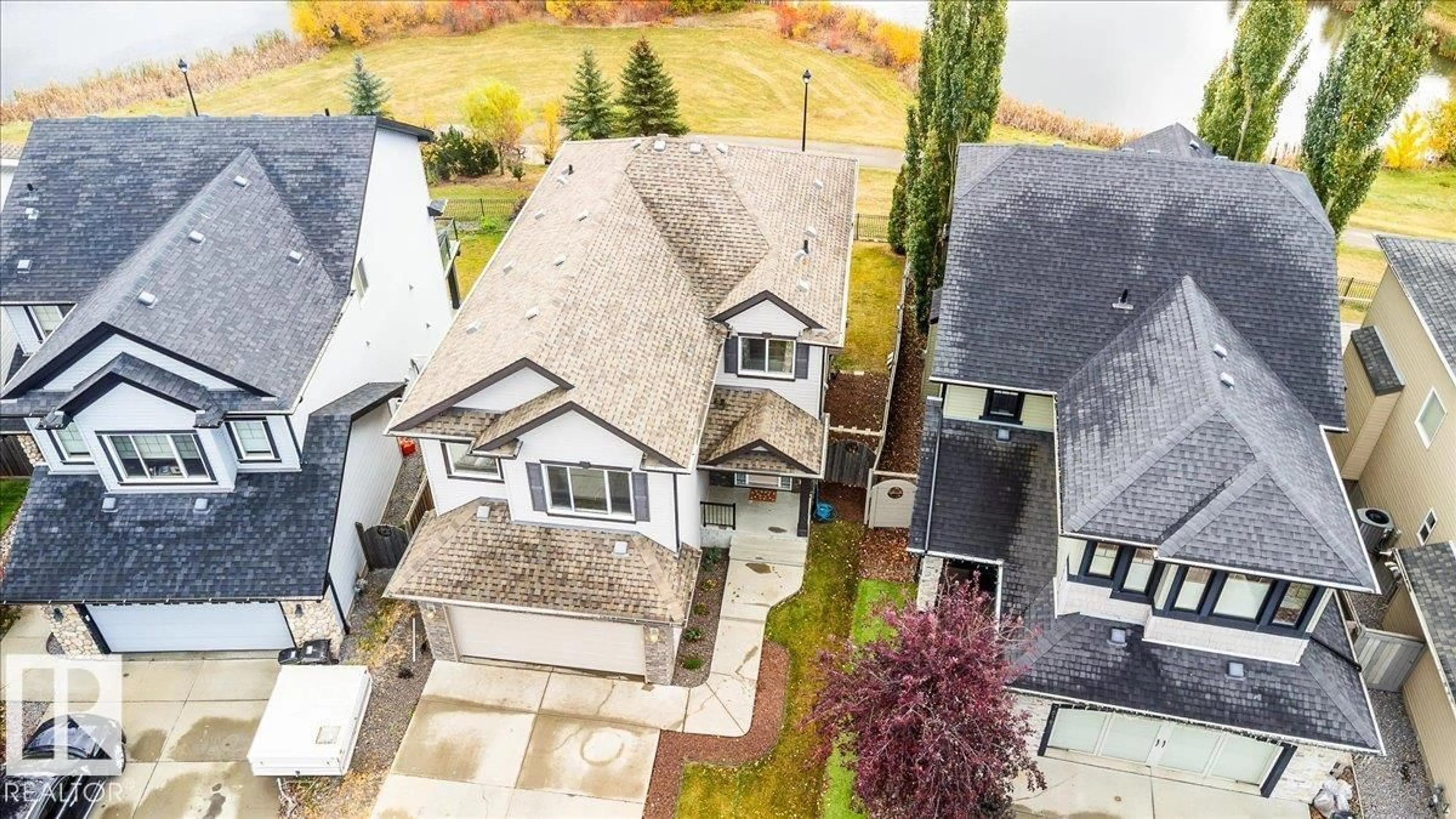 A pic from outside/outdoor area/front of a property/back of a property/a pic from drone, street for 7521 SPEAKER WY, Edmonton Alberta T6R0P2