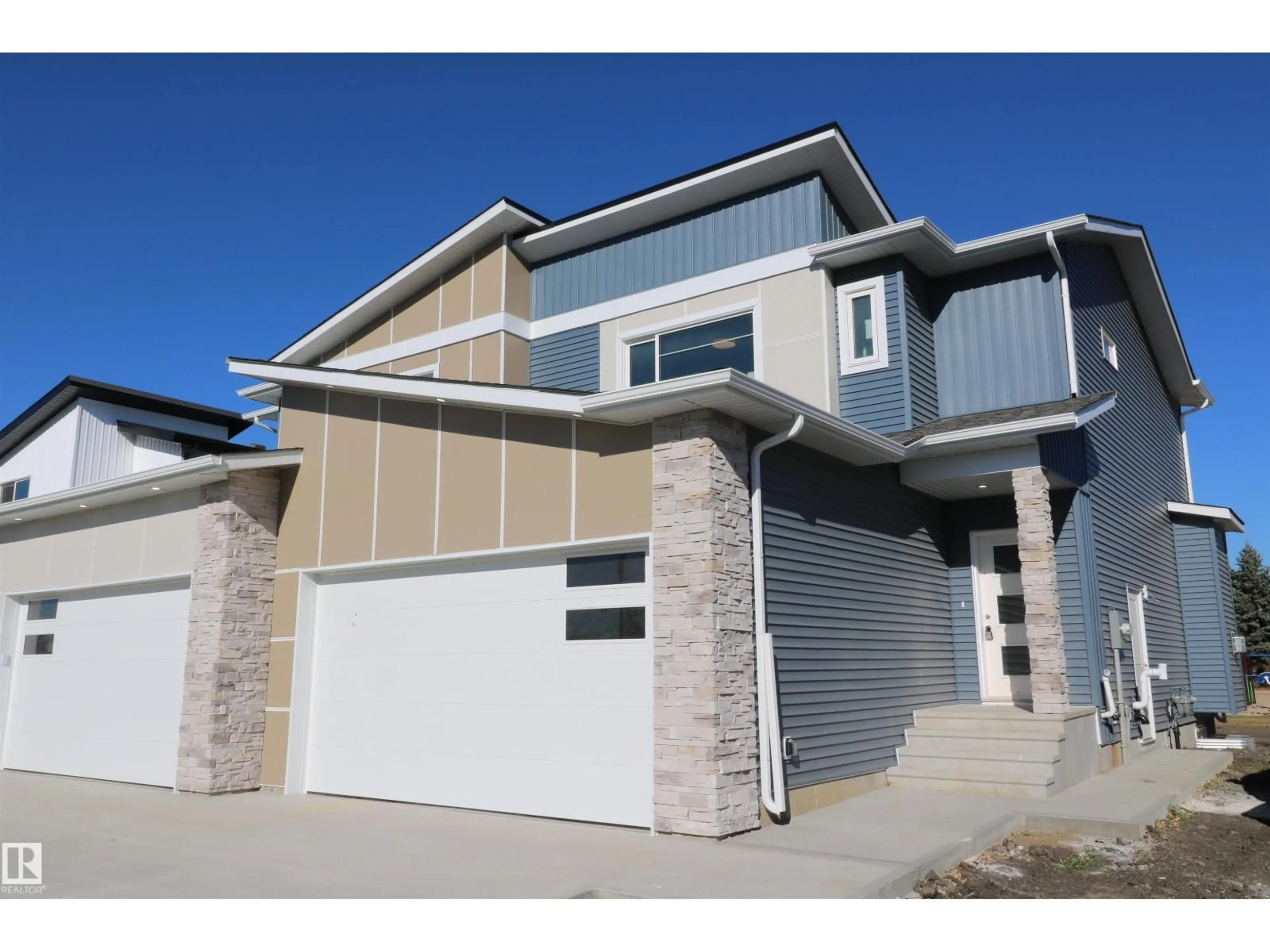 Home with vinyl exterior material, street for 4904 49 AV, Gibbons Alberta T0A1N0
