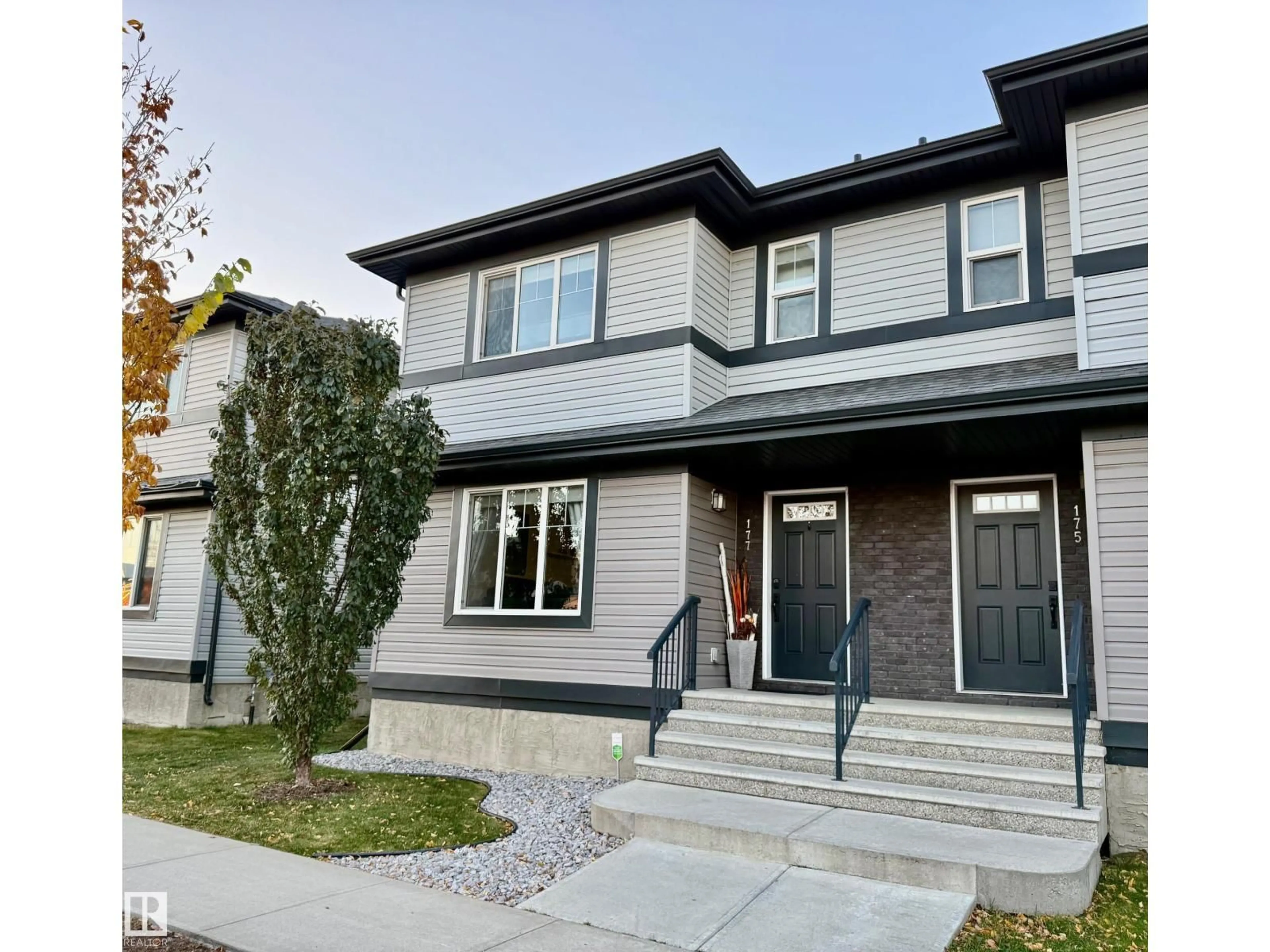 Home with vinyl exterior material, street for 177 RADCLIFFE WD, Fort Saskatchewan Alberta T8L0S8