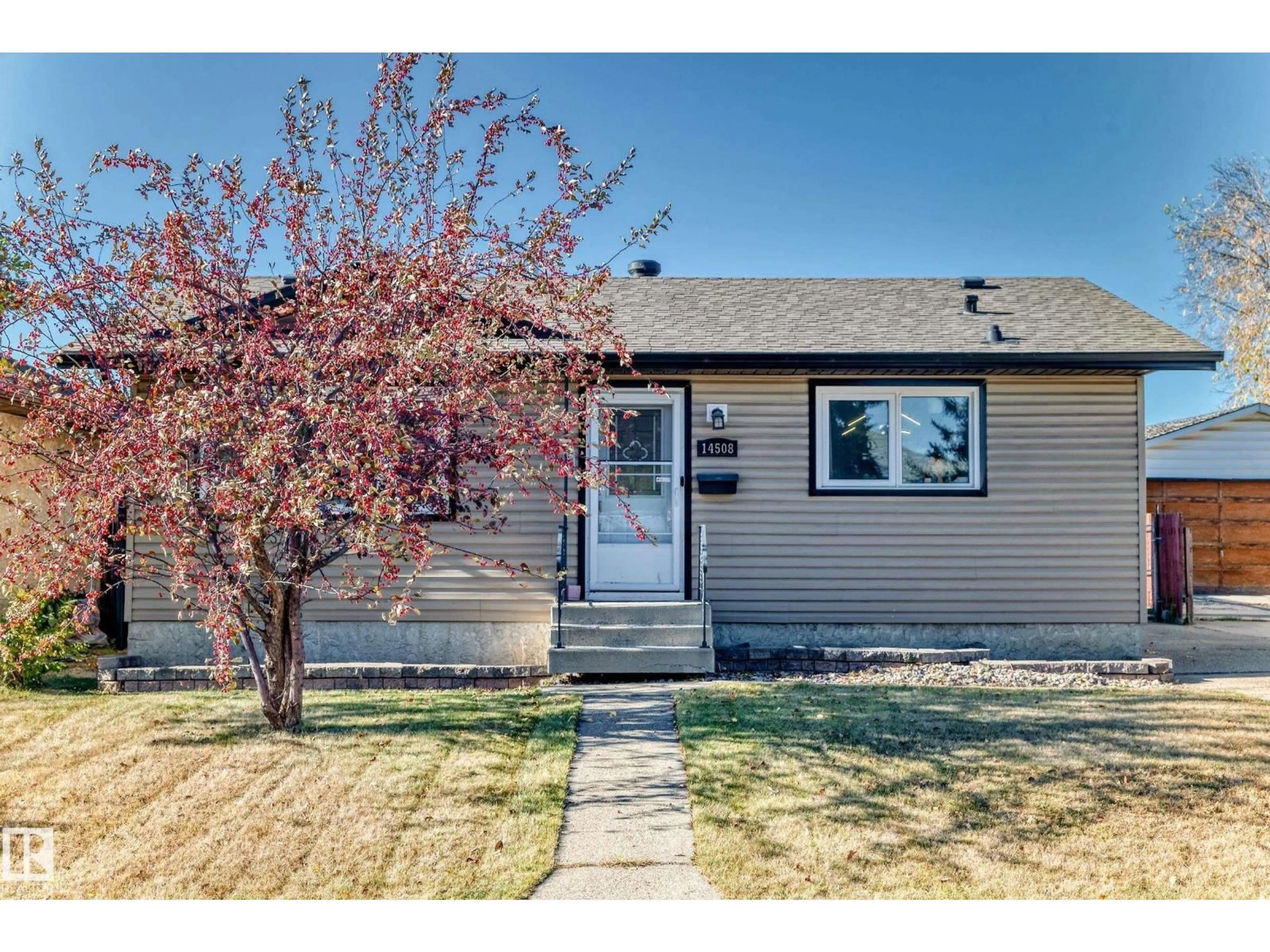 Home with vinyl exterior material, street for 14508 21 ST, Edmonton Alberta T5Y1T8