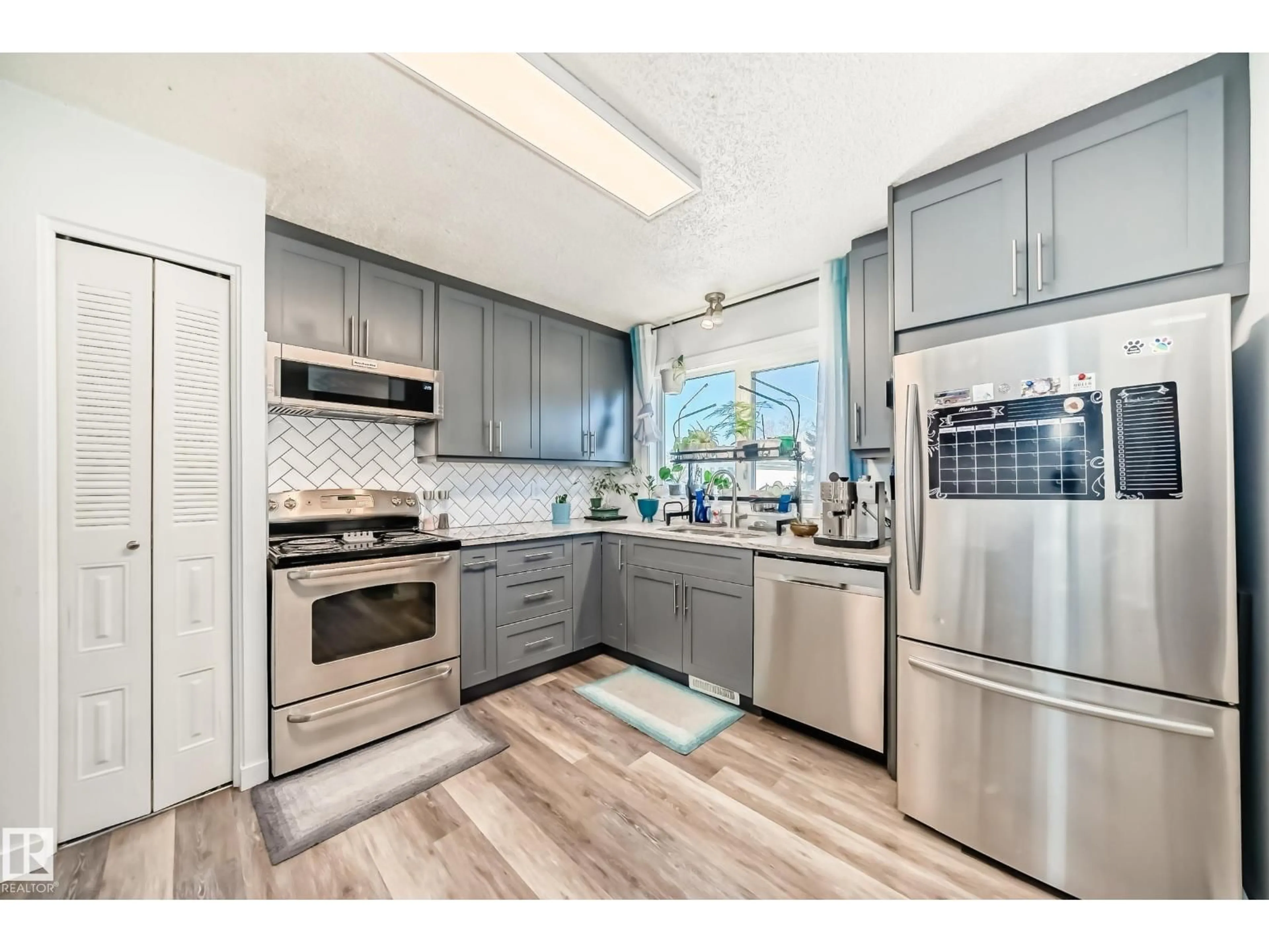 Open concept kitchen, unknown for 14508 21 ST, Edmonton Alberta T5Y1T8