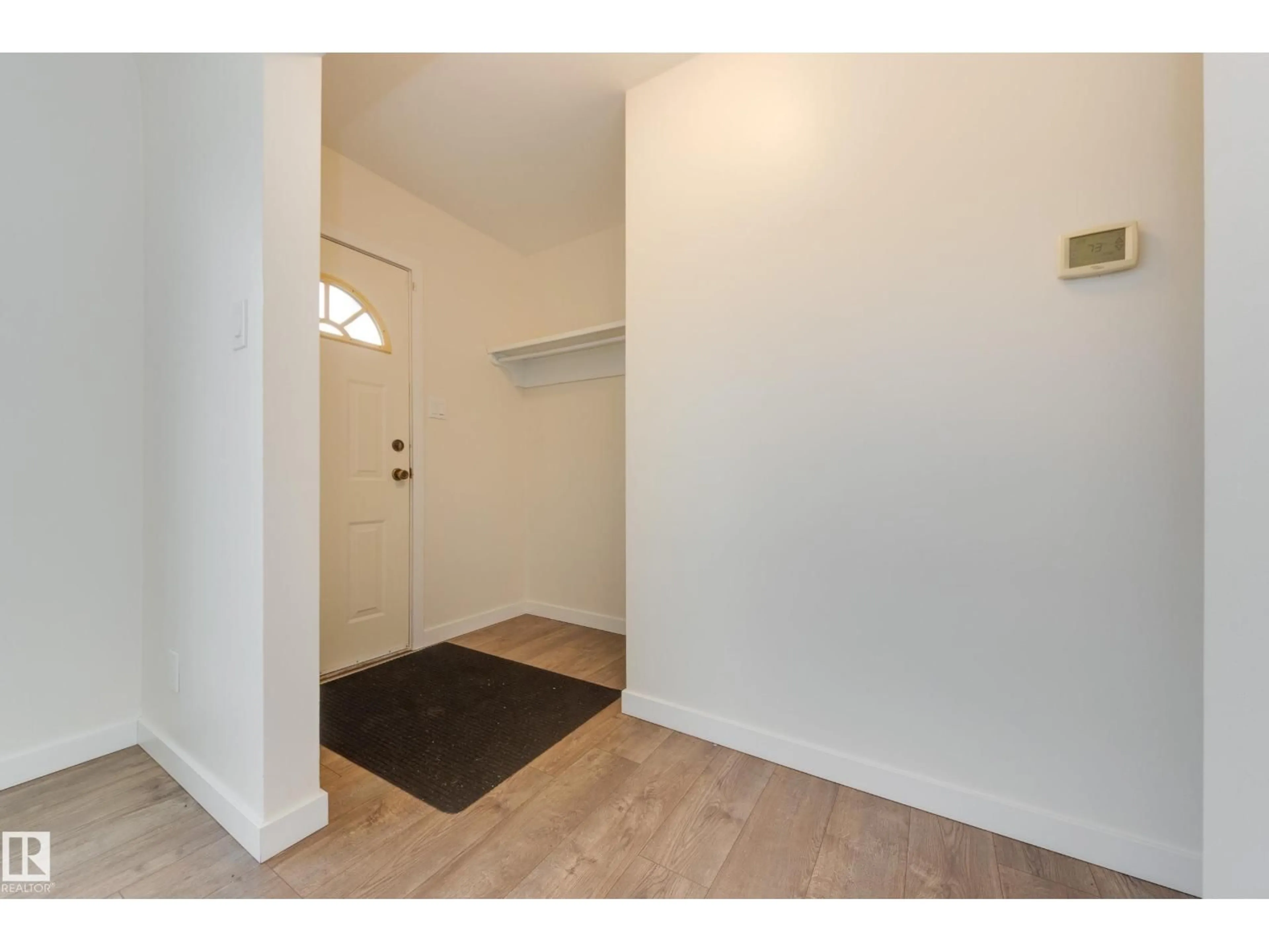 Indoor entryway for 13236 115 AV, Edmonton Alberta T5M3A6
