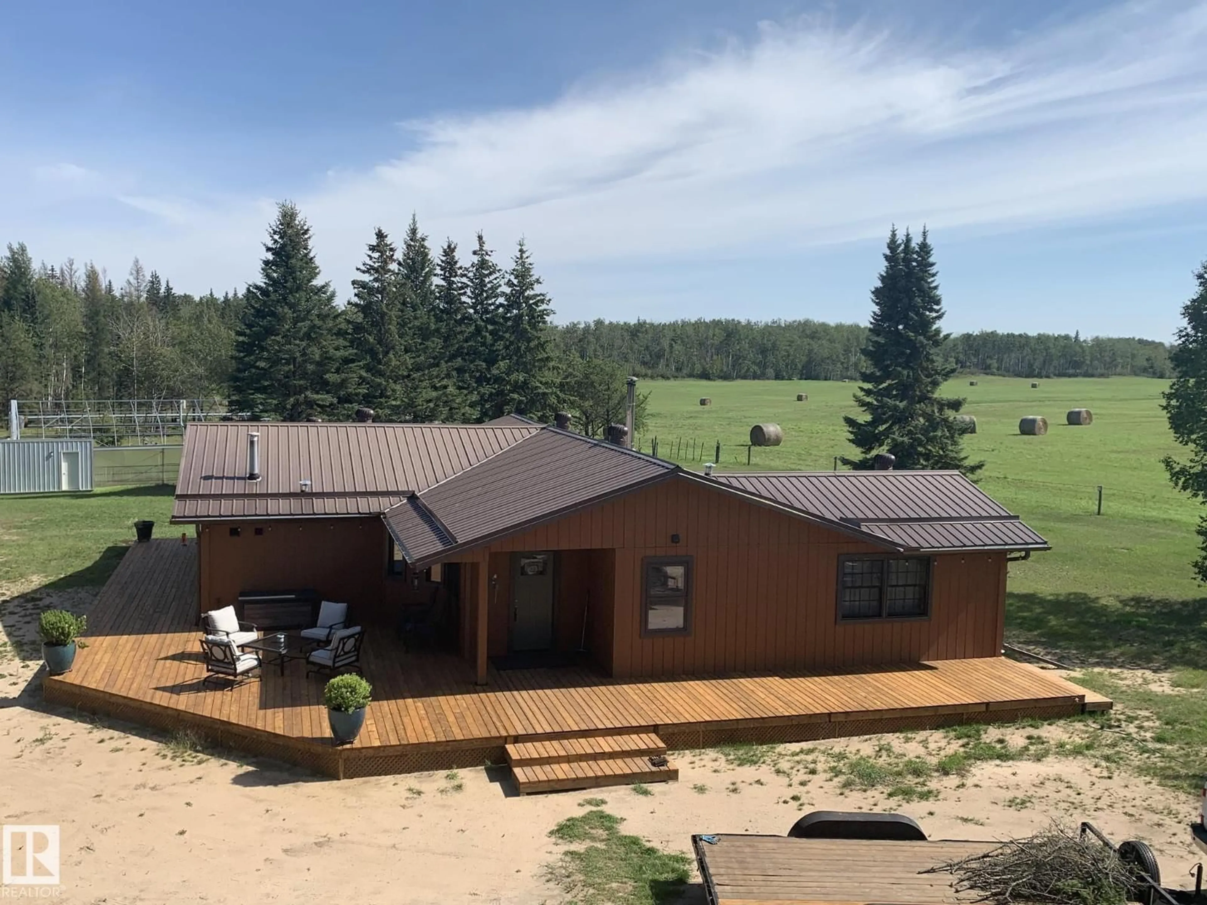 A pic from outside/outdoor area/front of a property/back of a property/a pic from drone, mountain view for 49321 TWP RD 630, Rural Bonnyville M.D. Alberta T0A0T0