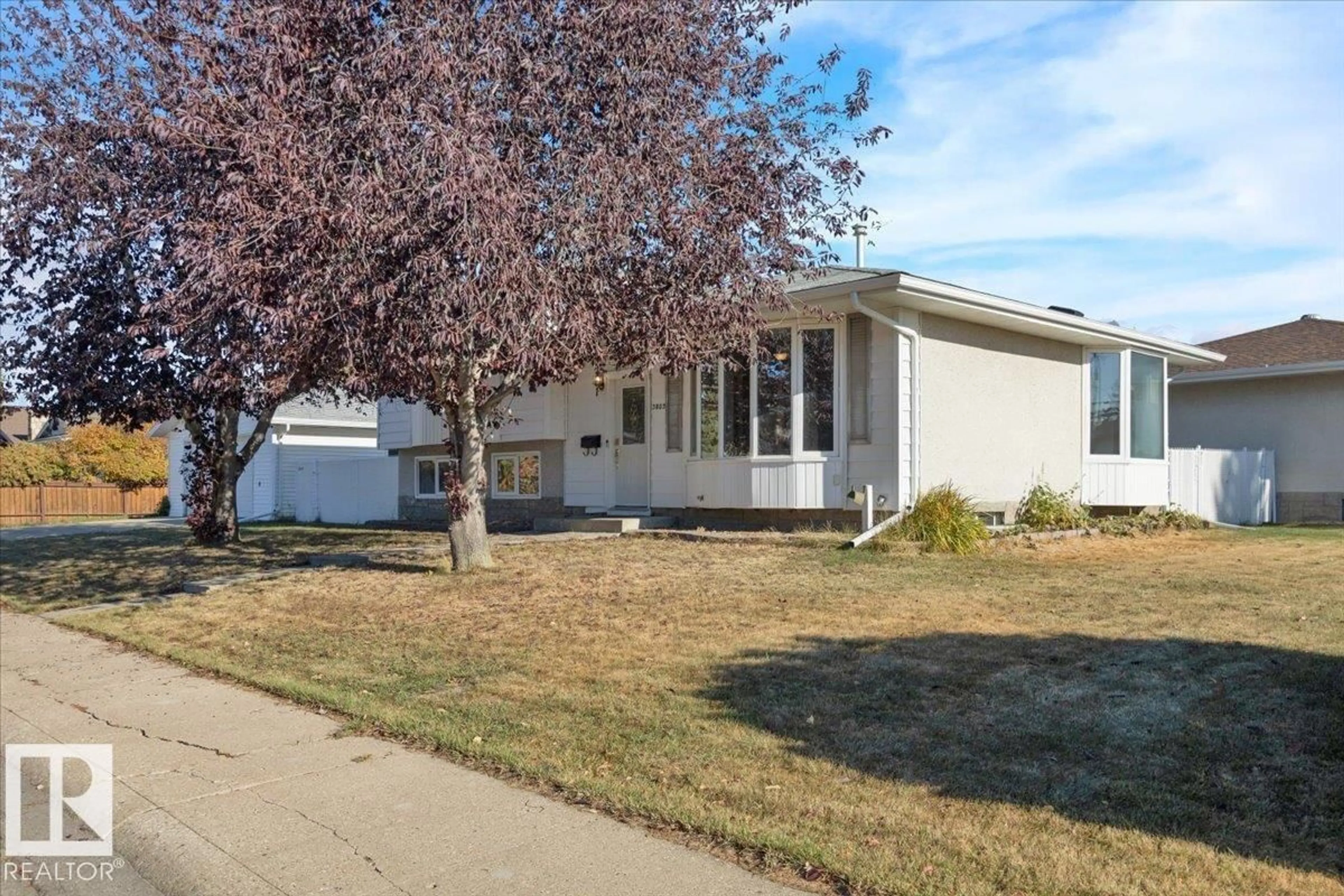 Home with vinyl exterior material, street for NW - 3803 112 ST, Edmonton Alberta T6J1J1